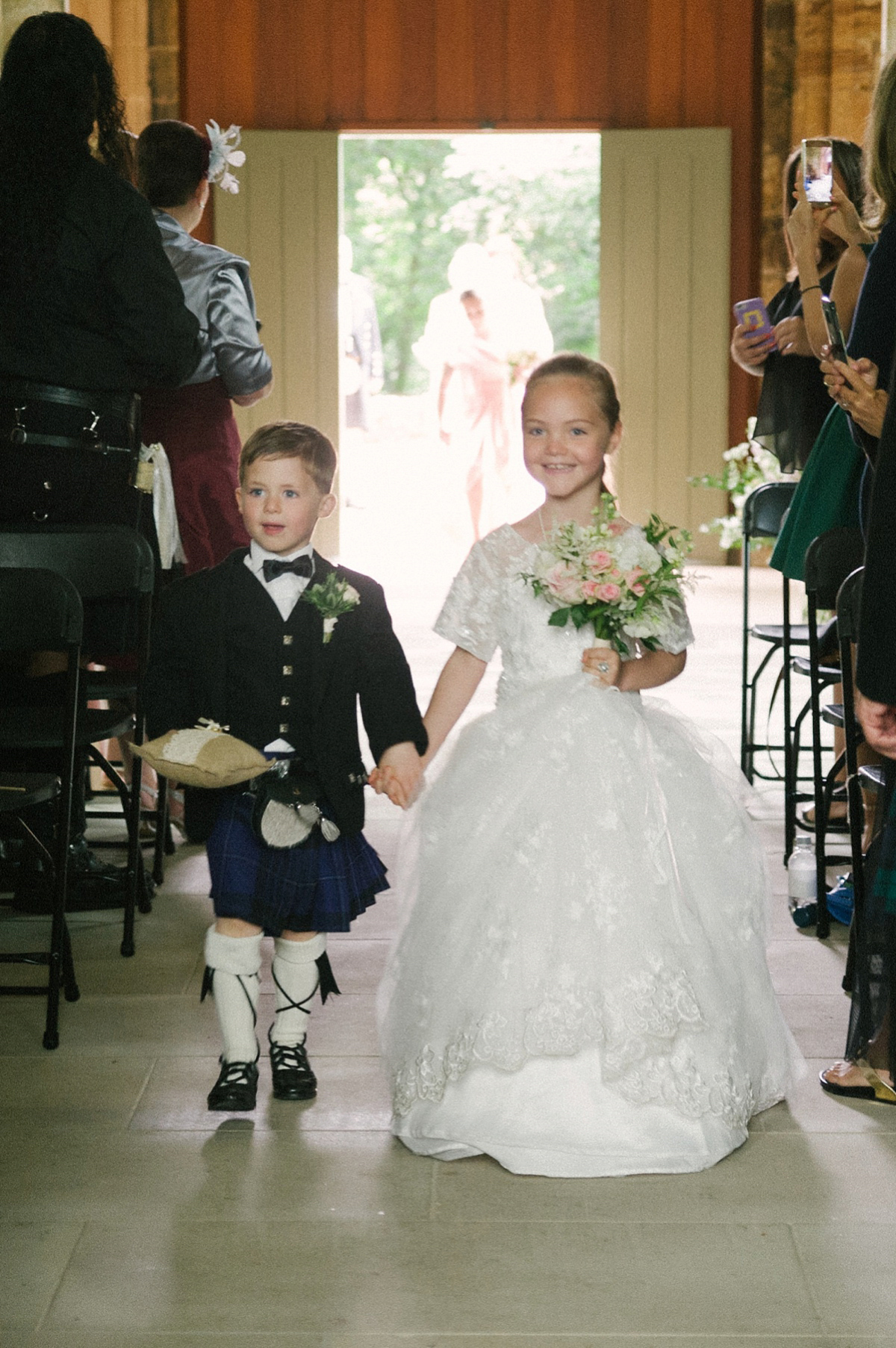 Megan wore Maggie Sottero for her American-English and travel inspired wedding in Scotland. Images captued by ChicPhoto.