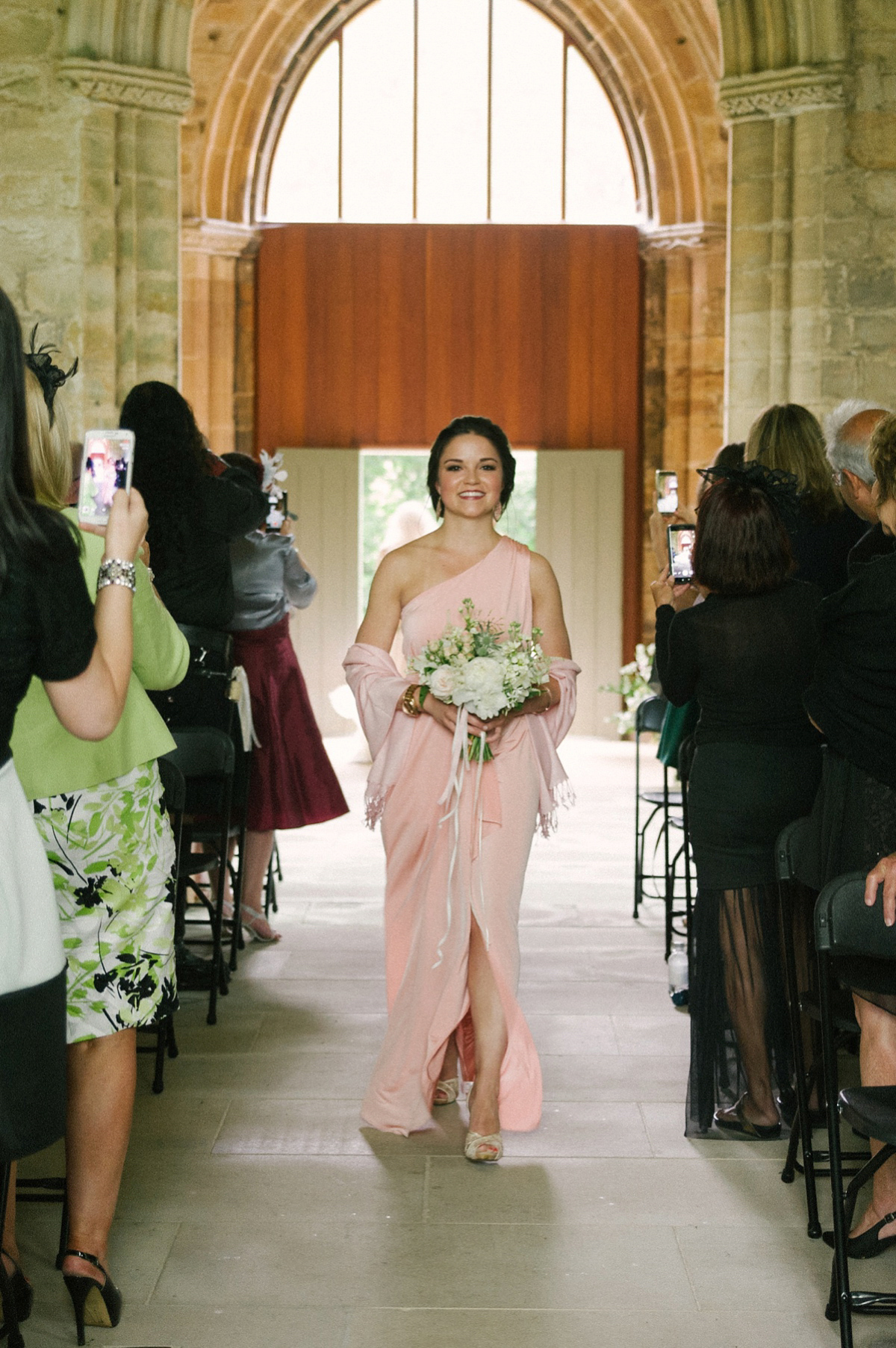 Megan wore Maggie Sottero for her American-English and travel inspired wedding in Scotland. Images captued by ChicPhoto.