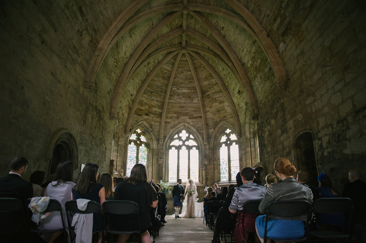 Megan wore Maggie Sottero for her American-English and travel inspired wedding in Scotland. Images captued by ChicPhoto.