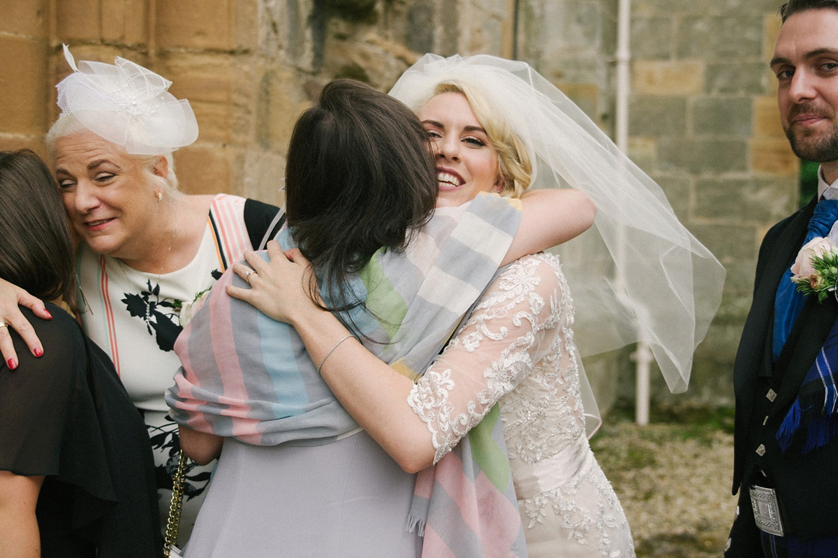 Megan wore Maggie Sottero for her American-English and travel inspired wedding in Scotland. Images captued by ChicPhoto.