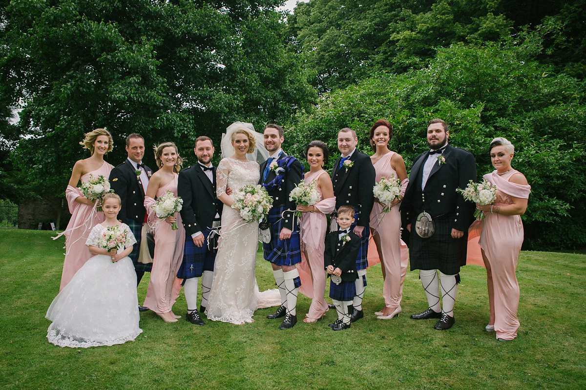 Megan wore Maggie Sottero for her American-English and travel inspired wedding in Scotland. Images captued by ChicPhoto.