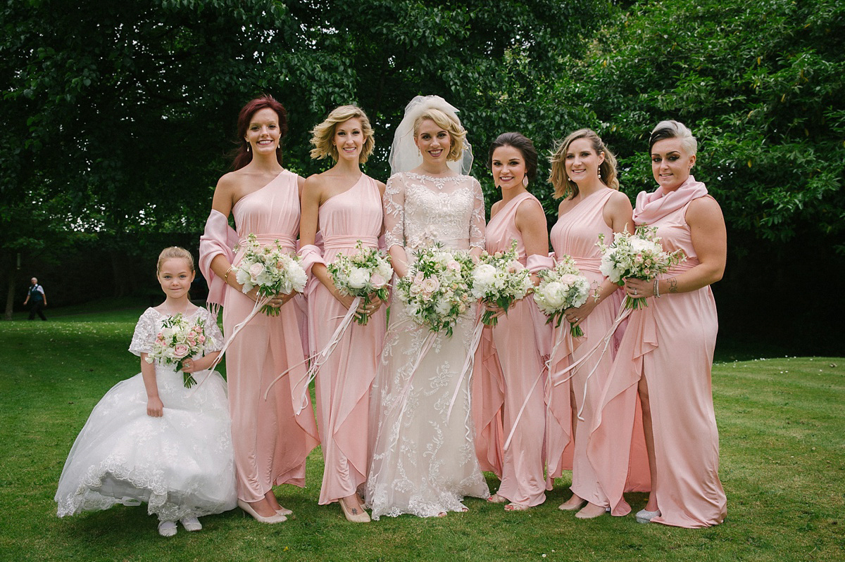 Megan wore Maggie Sottero for her American-English and travel inspired wedding in Scotland. Images captued by ChicPhoto.