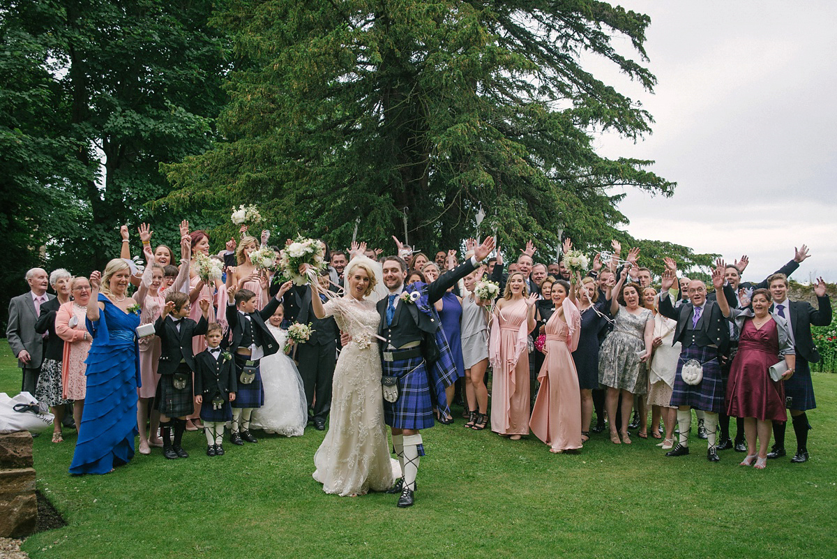 Megan wore Maggie Sottero for her American-English and travel inspired wedding in Scotland. Images captued by ChicPhoto.