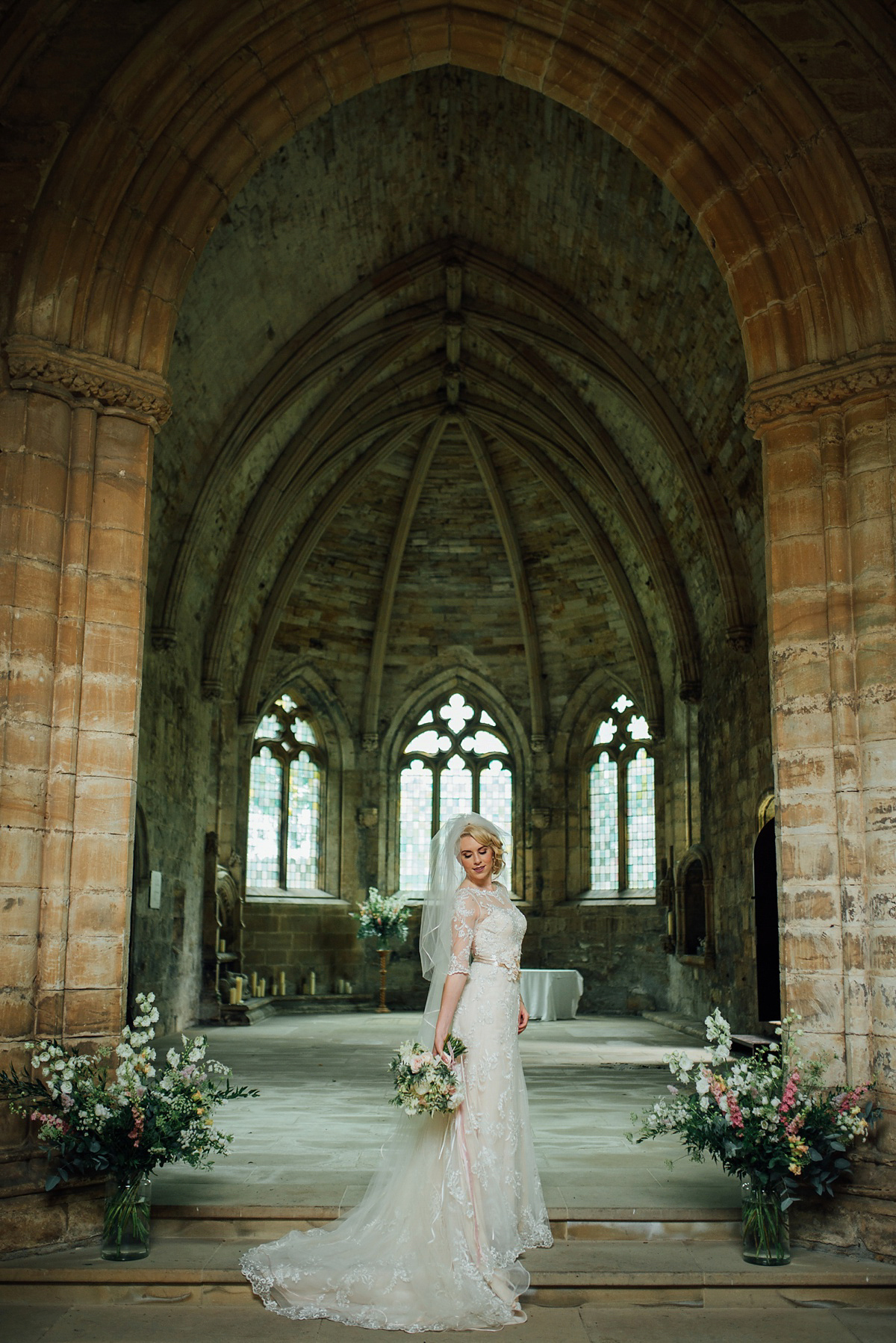 Megan wore Maggie Sottero for her American-English and travel inspired wedding in Scotland. Images captued by ChicPhoto.