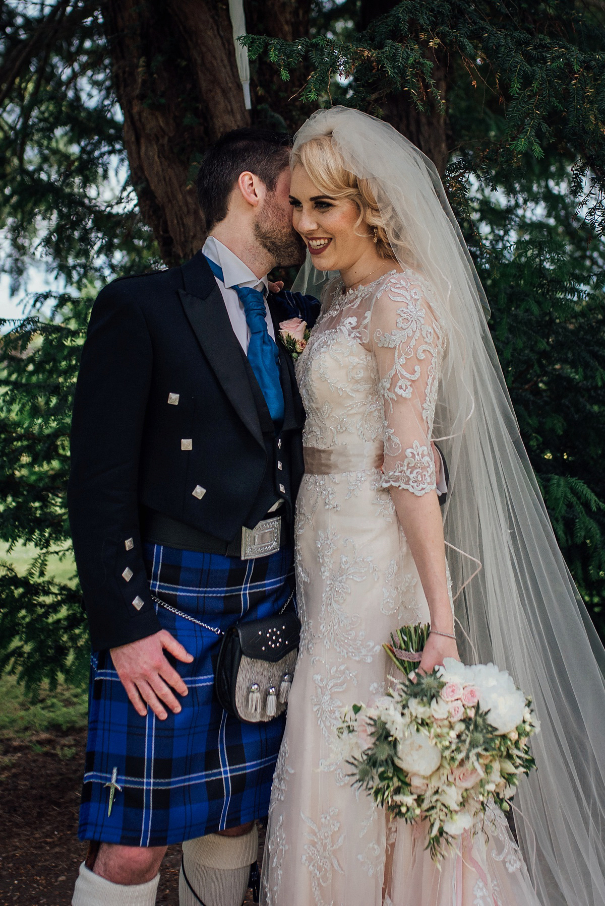 Megan wore Maggie Sottero for her American-English and travel inspired wedding in Scotland. Images captued by ChicPhoto.