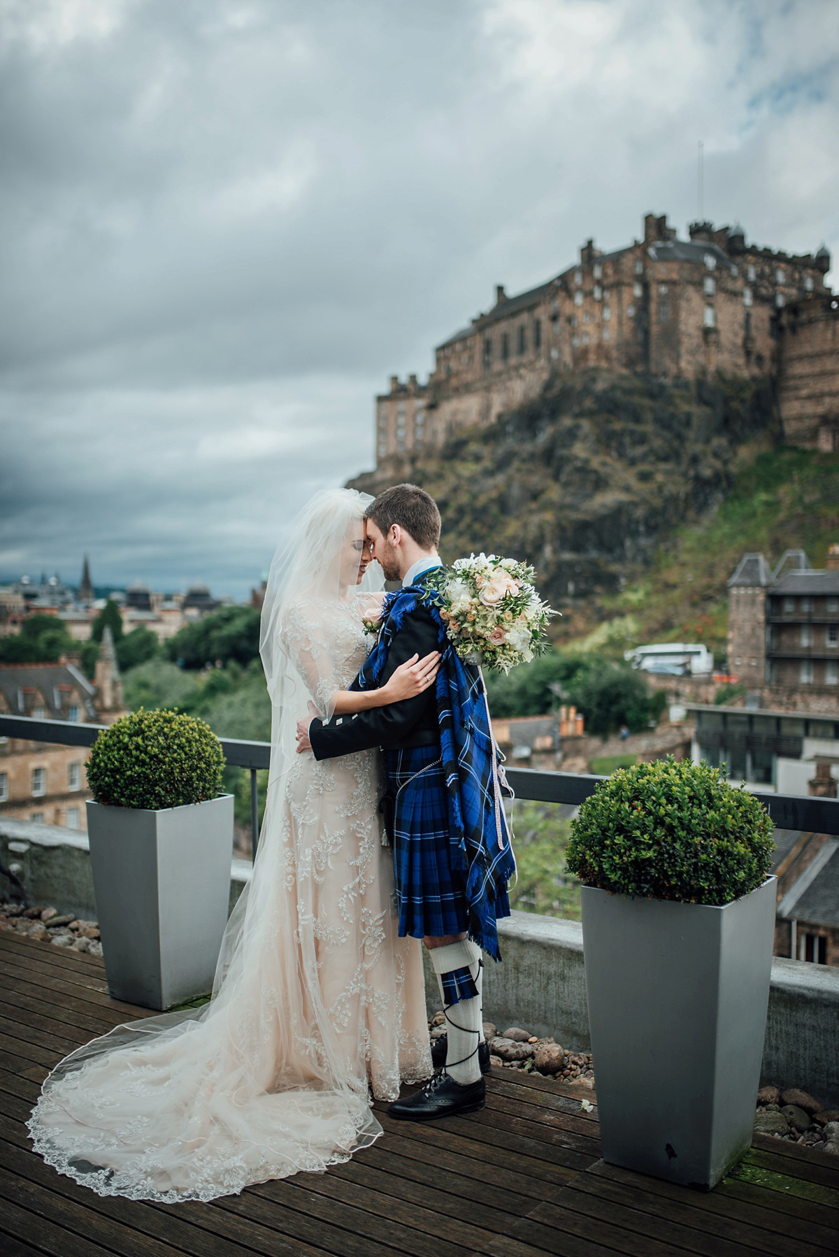 Megan wore Maggie Sottero for her American-English and travel inspired wedding in Scotland. Images captued by ChicPhoto.