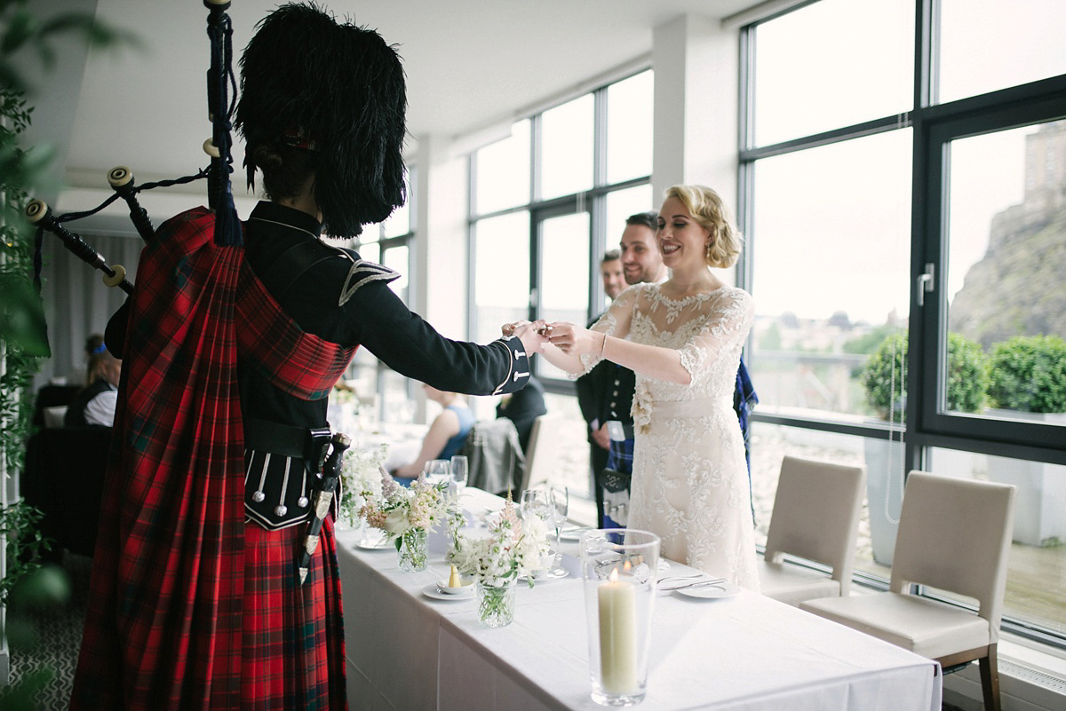 Megan wore Maggie Sottero for her American-English and travel inspired wedding in Scotland. Images captued by ChicPhoto.