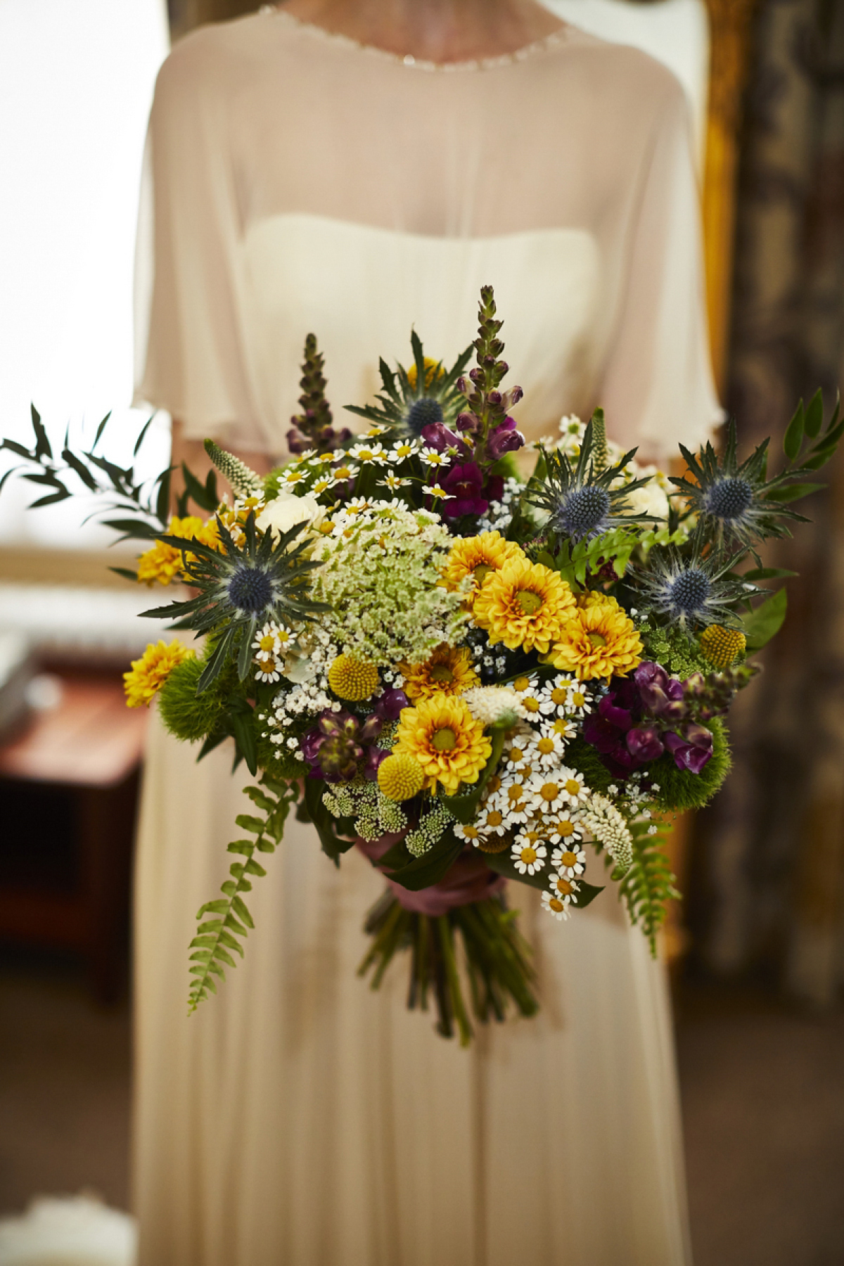 Sarah wore 'Betty' by Jenny Packham for her Yorkshire Dales and English woodland inspired Autumn wedding in York. Photography by David Lindsay.