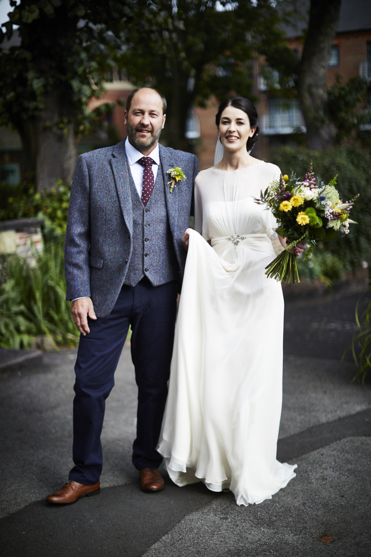 Sarah wore 'Betty' by Jenny Packham for her Yorkshire Dales and English woodland inspired Autumn wedding in York. Photography by David Lindsay.