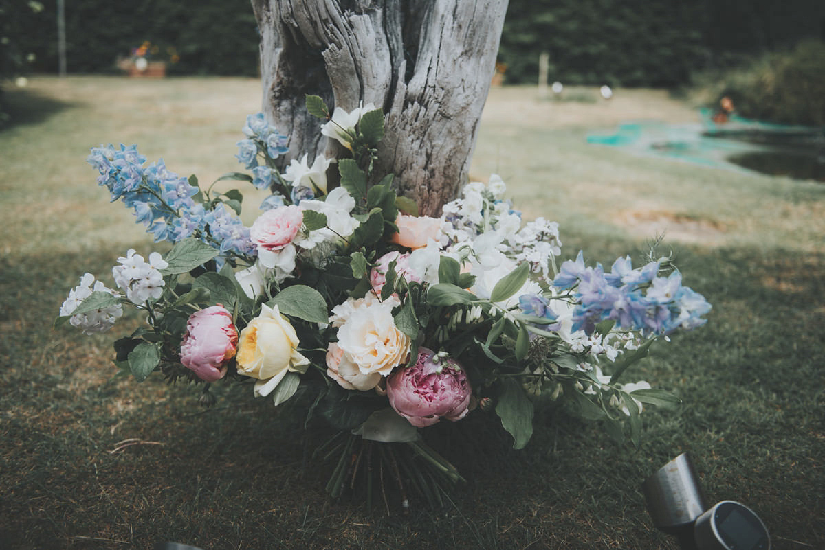 Anya wore a Sabina Motasem gown and floral crown for her vintage seaside inspired wedding. Photography by Eliza Claire.