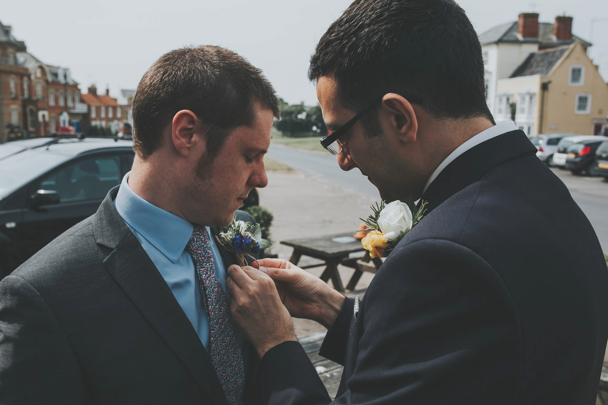 Anya wore a Sabina Motasem gown and floral crown for her vintage seaside inspired wedding. Photography by Eliza Claire.