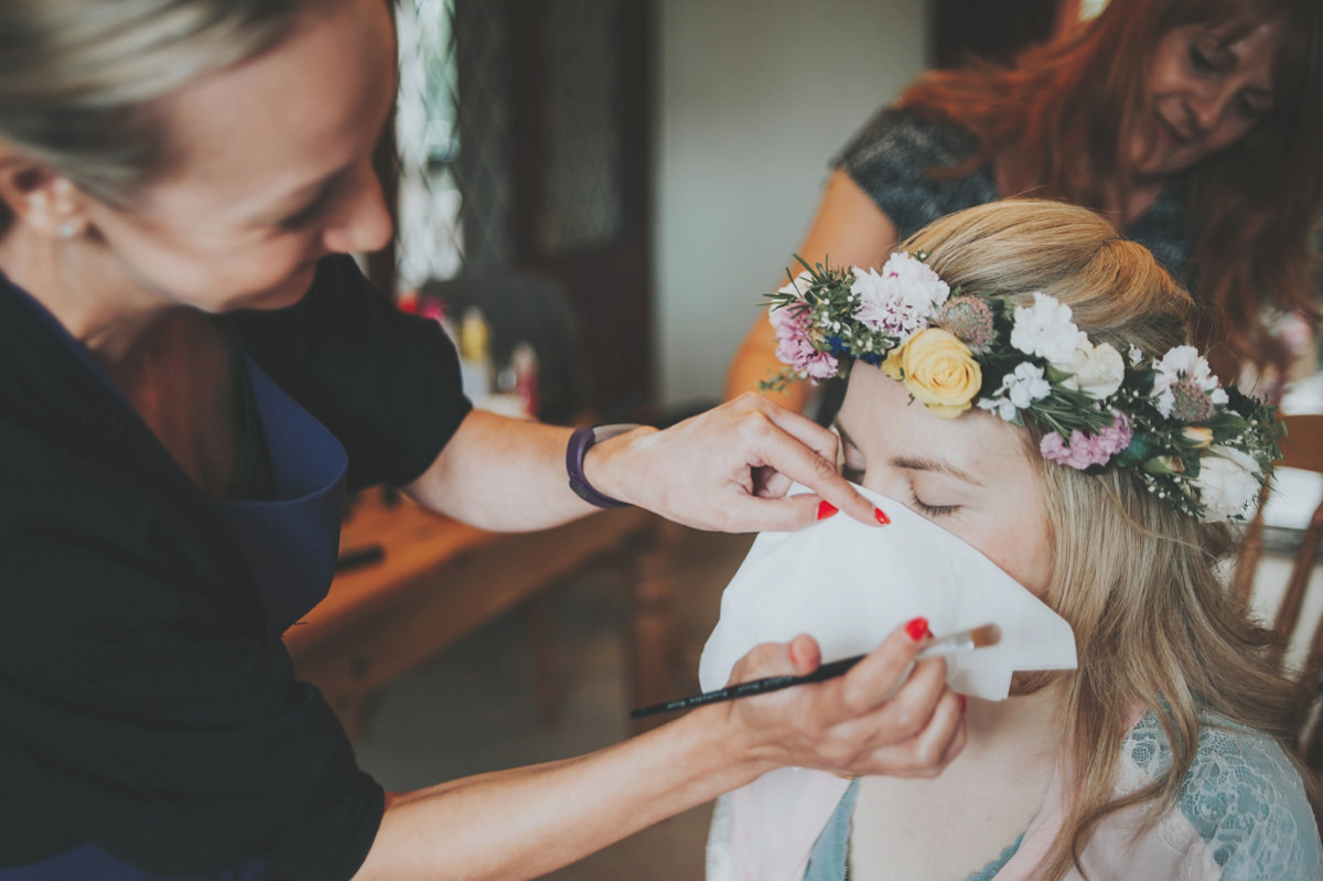 Anya wore a Sabina Motasem gown and floral crown for her vintage seaside inspired wedding. Photography by Eliza Claire.