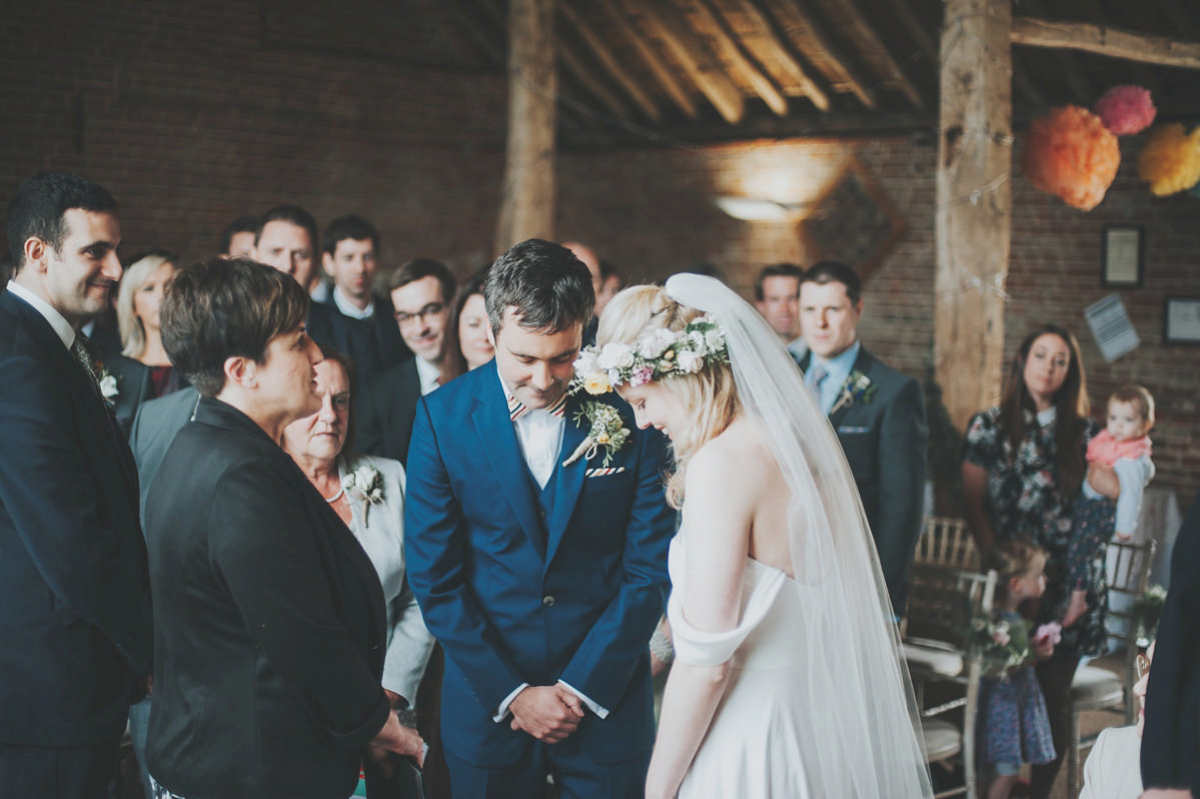 Anya wore a Sabina Motasem gown and floral crown for her vintage seaside inspired wedding. Photography by Eliza Claire.