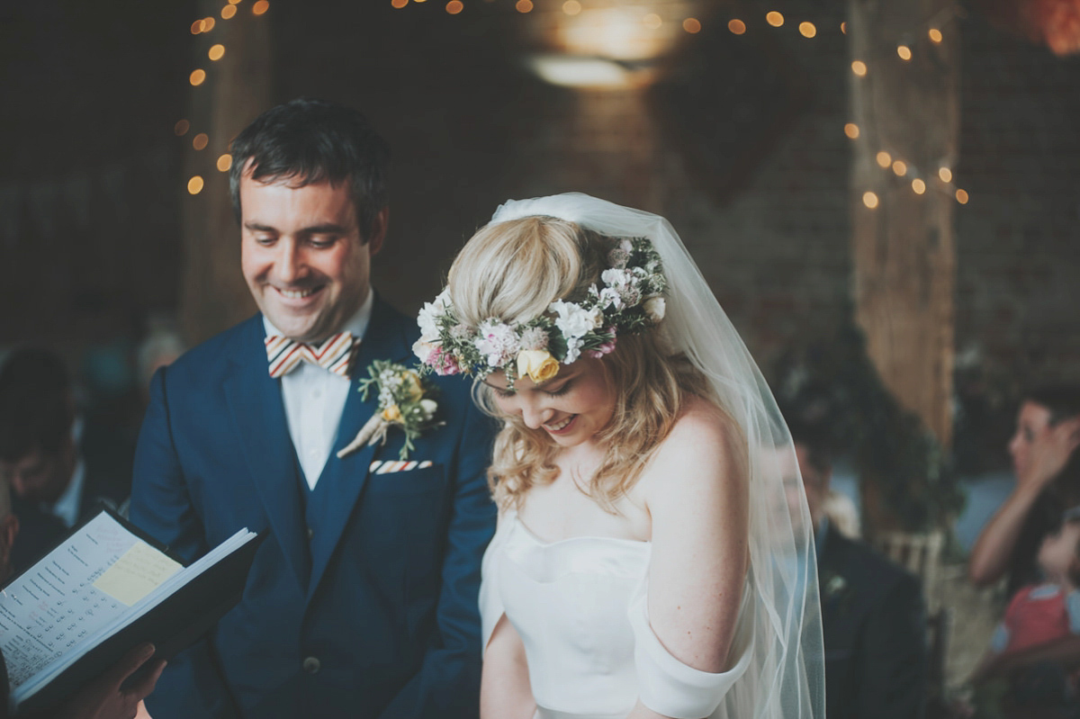 Anya wore a Sabina Motasem gown and floral crown for her vintage seaside inspired wedding. Photography by Eliza Claire.