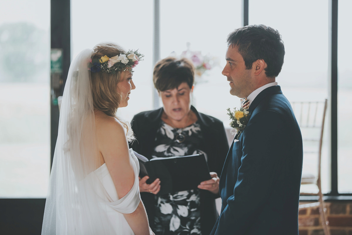 Anya wore a Sabina Motasem gown and floral crown for her vintage seaside inspired wedding. Photography by Eliza Claire.