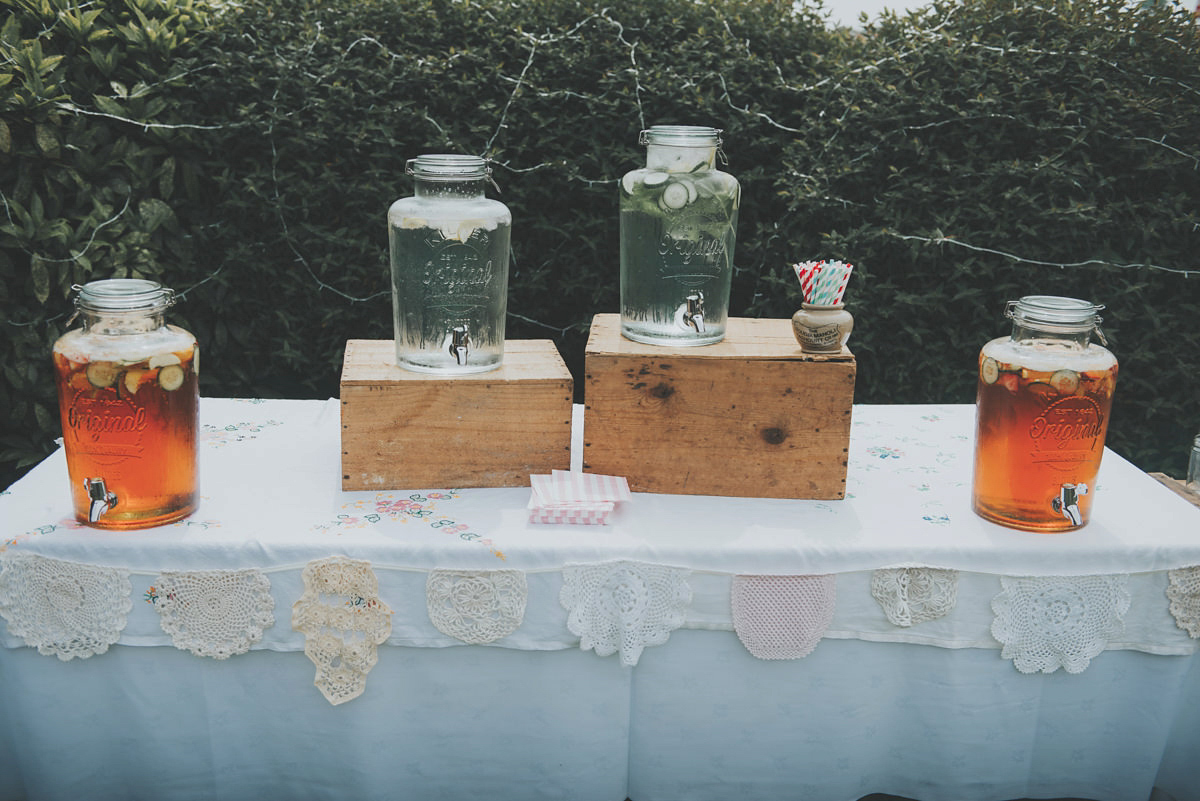 Anya wore a Sabina Motasem gown and floral crown for her vintage seaside inspired wedding. Photography by Eliza Claire.