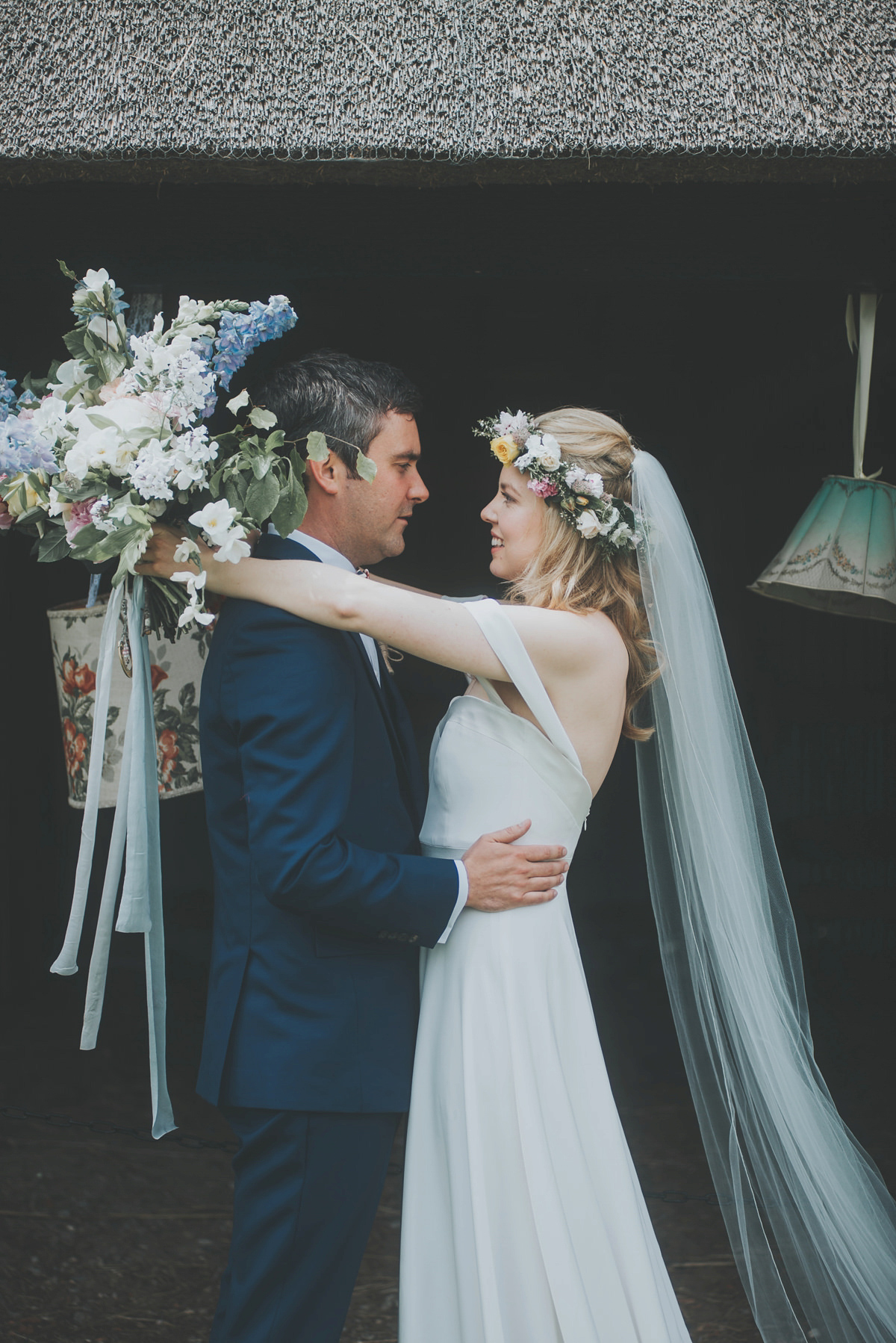 Anya wore a Sabina Motasem gown and floral crown for her vintage seaside inspired wedding. Photography by Eliza Claire.