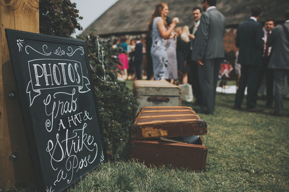 Anya wore a Sabina Motasem gown and floral crown for her vintage seaside inspired wedding. Photography by Eliza Claire.