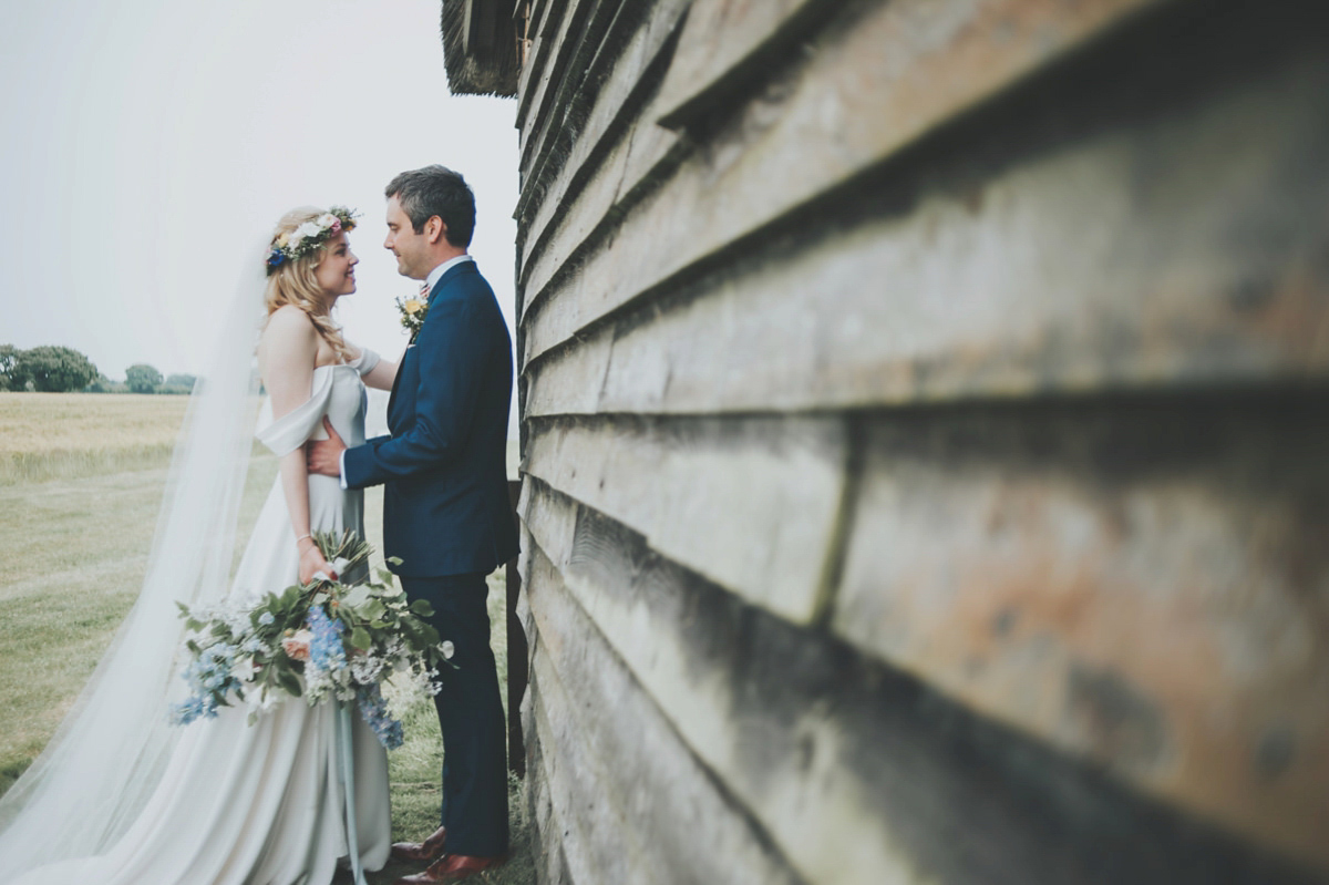 Anya wore a Sabina Motasem gown and floral crown for her vintage seaside inspired wedding. Photography by Eliza Claire.