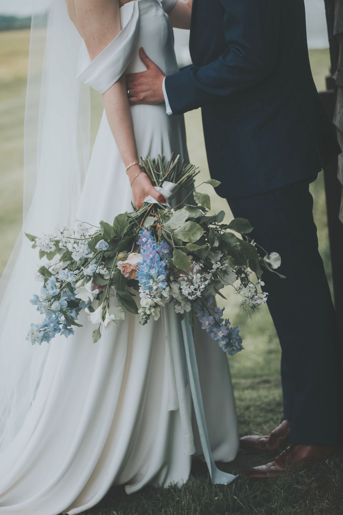 Anya wore a Sabina Motasem gown and floral crown for her vintage seaside inspired wedding. Photography by Eliza Claire.