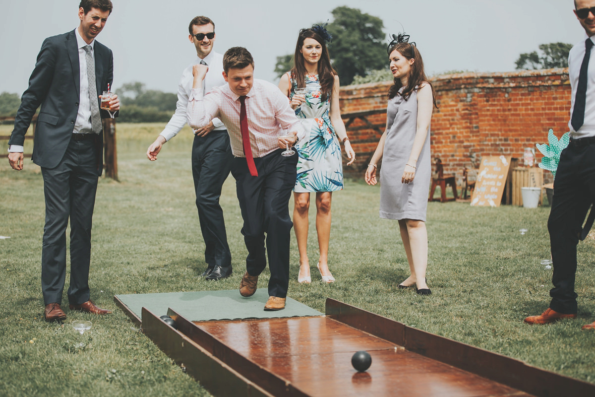 Anya wore a Sabina Motasem gown and floral crown for her vintage seaside inspired wedding. Photography by Eliza Claire.