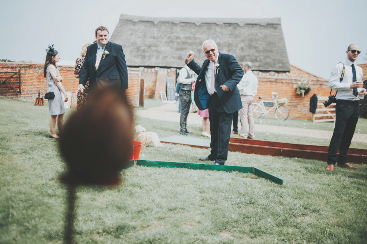 Anya wore a Sabina Motasem gown and floral crown for her vintage seaside inspired wedding. Photography by Eliza Claire.