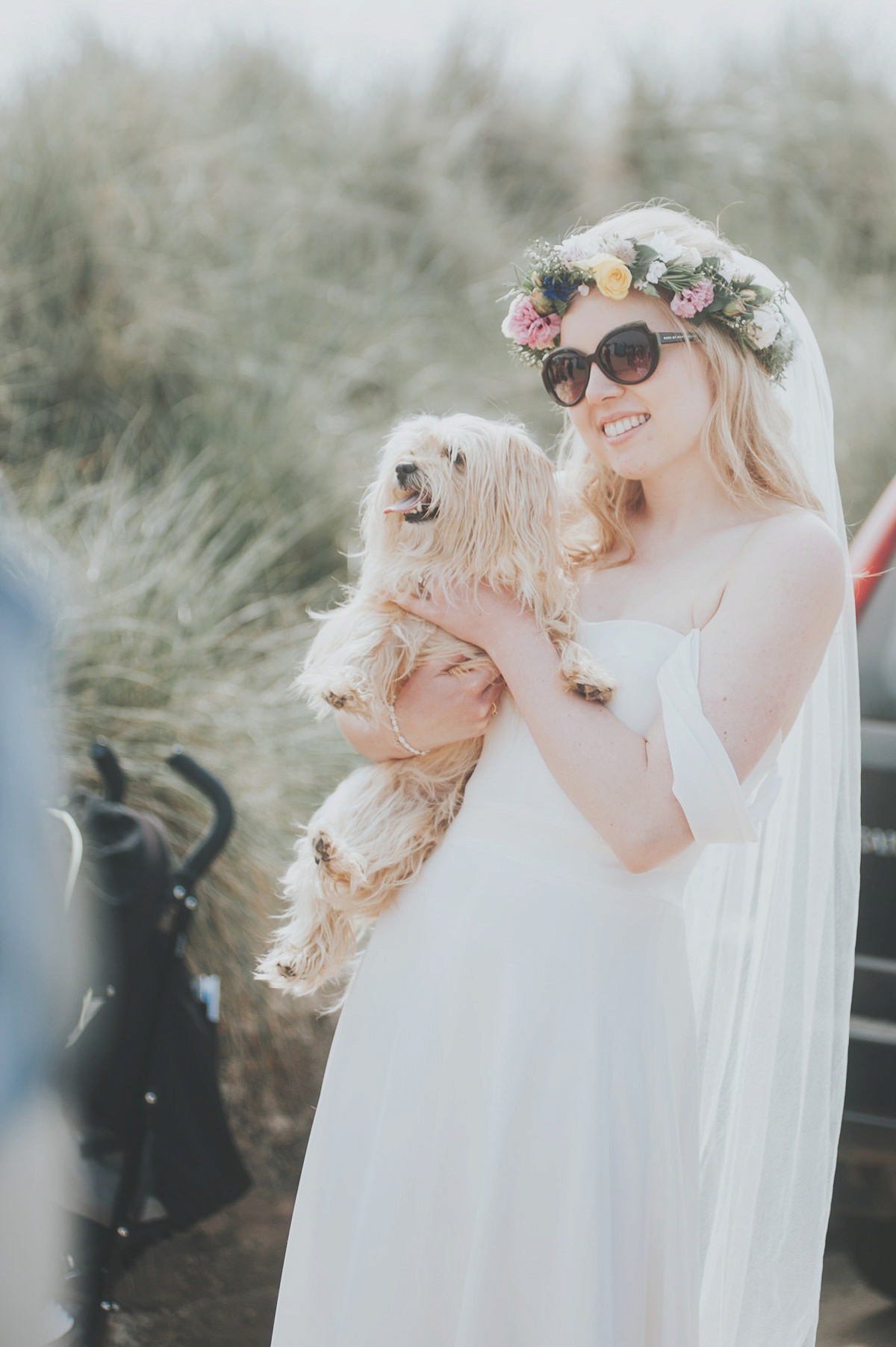 Anya wore a Sabina Motasem gown and floral crown for her vintage seaside inspired wedding. Photography by Eliza Claire.