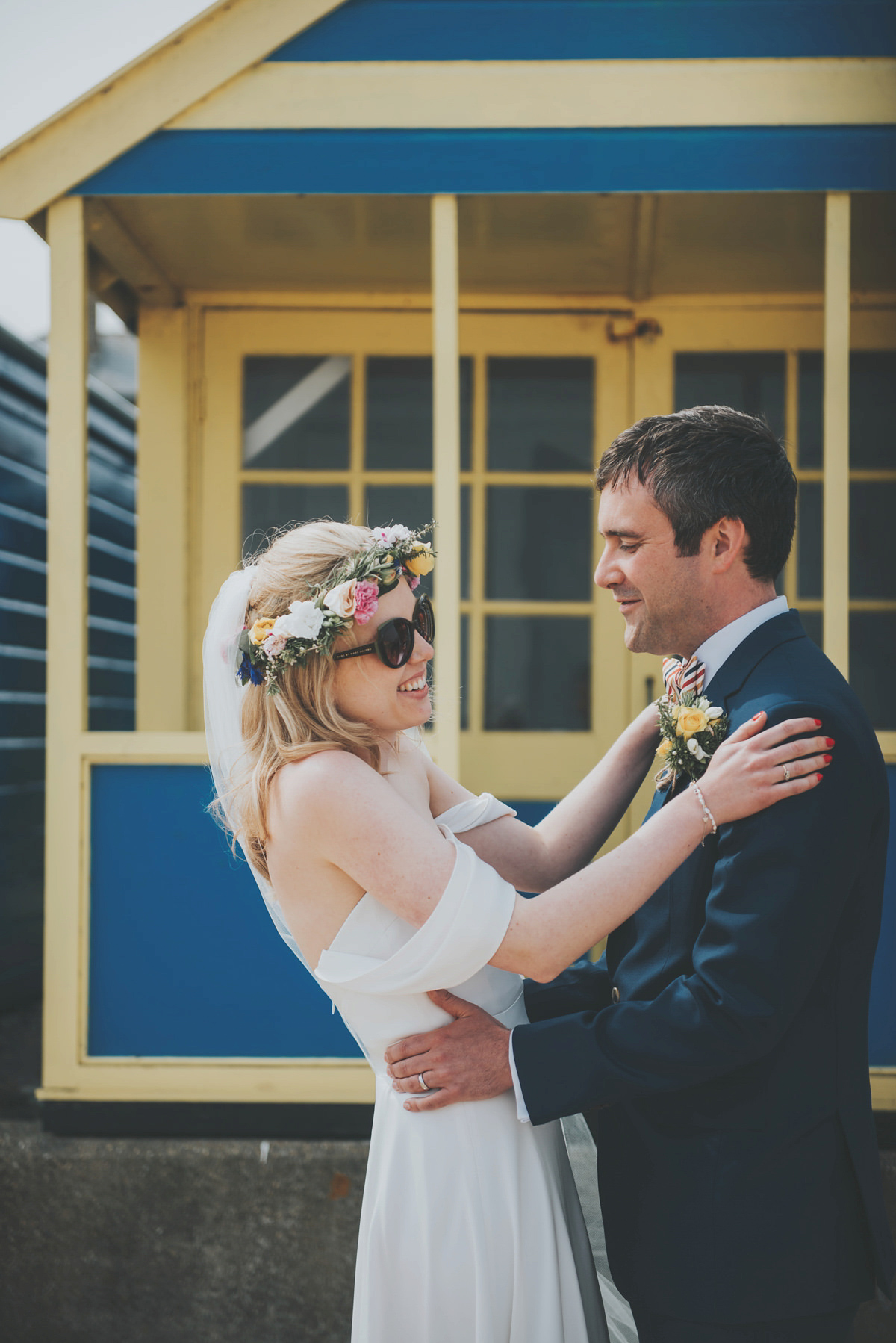 Anya wore a Sabina Motasem gown and floral crown for her vintage seaside inspired wedding. Photography by Eliza Claire.