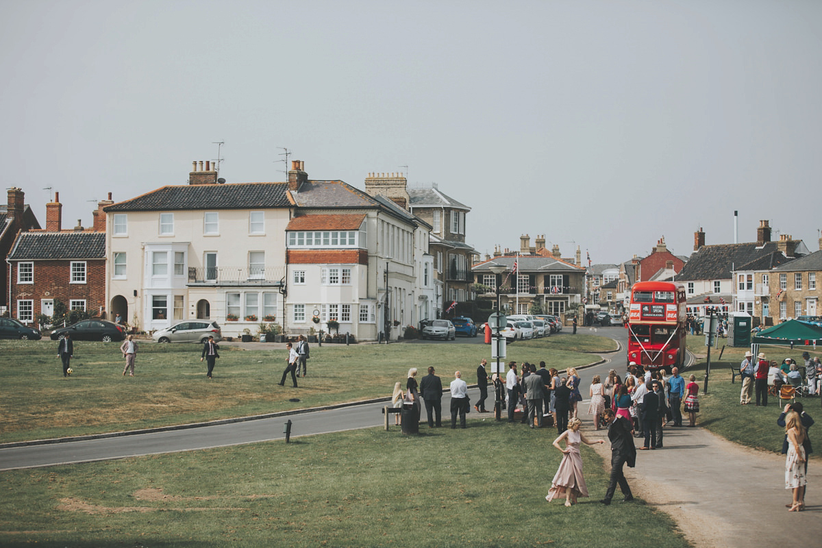 Anya wore a Sabina Motasem gown and floral crown for her vintage seaside inspired wedding. Photography by Eliza Claire.