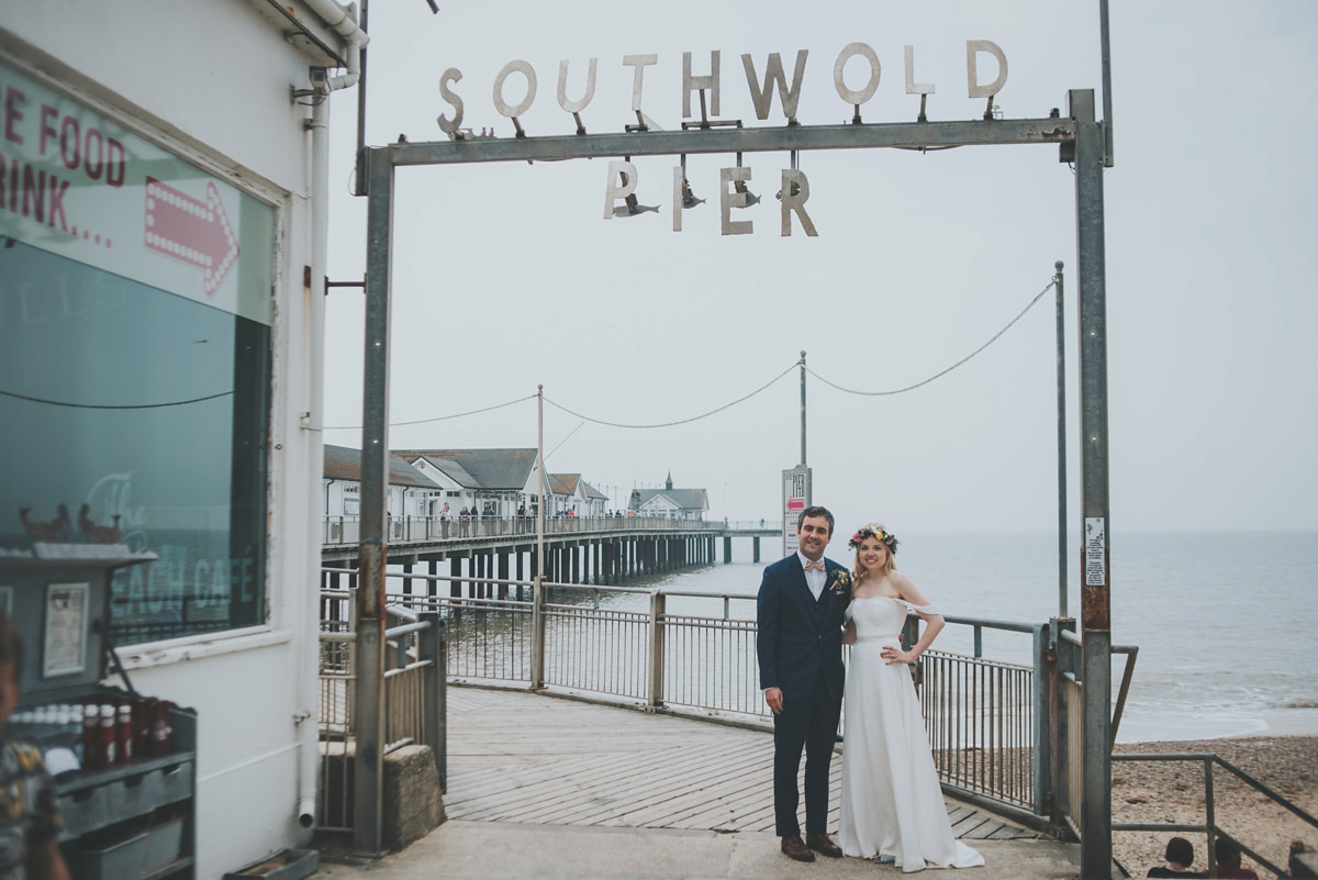 Anya wore a Sabina Motasem gown and floral crown for her vintage seaside inspired wedding. Photography by Eliza Claire.