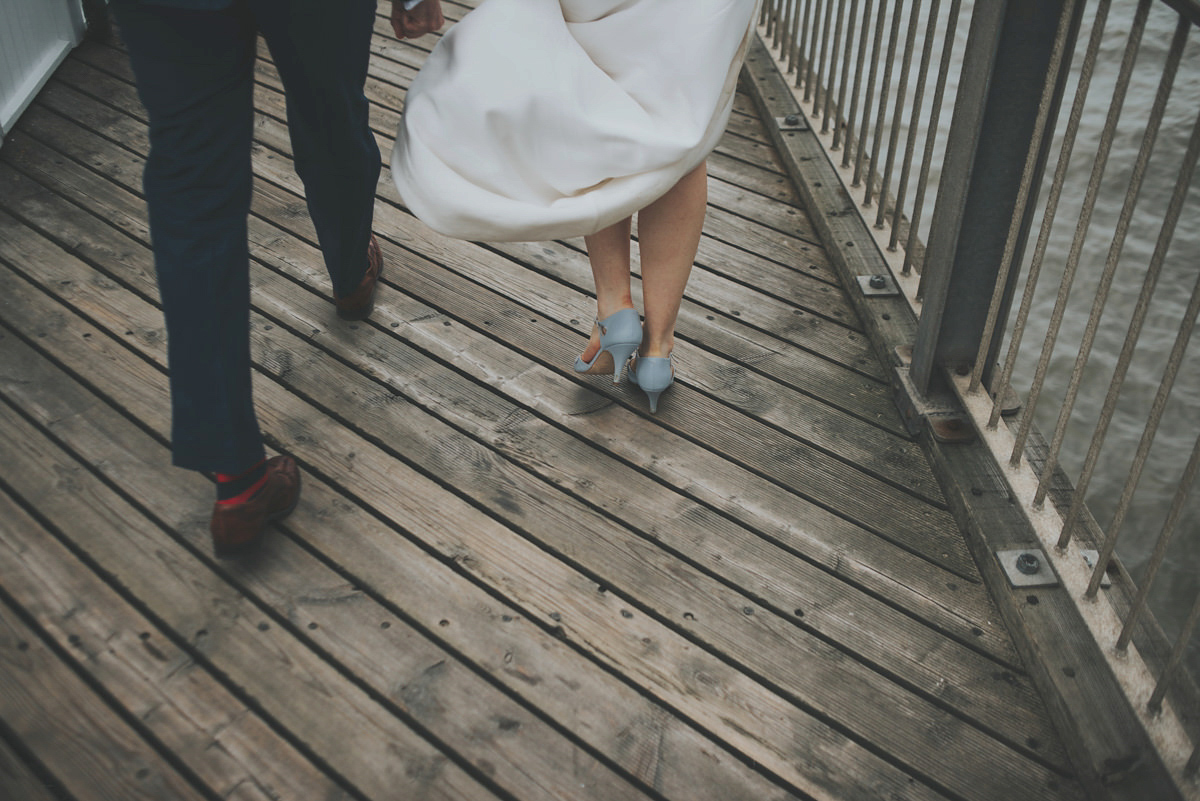 Anya wore a Sabina Motasem gown and floral crown for her vintage seaside inspired wedding. Photography by Eliza Claire.