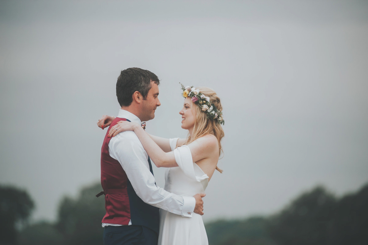 Anya wore a Sabina Motasem gown and floral crown for her vintage seaside inspired wedding. Photography by Eliza Claire.