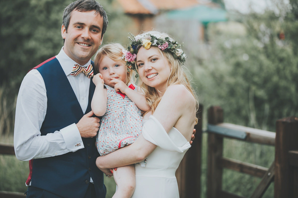 Anya wore a Sabina Motasem gown and floral crown for her vintage seaside inspired wedding. Photography by Eliza Claire.