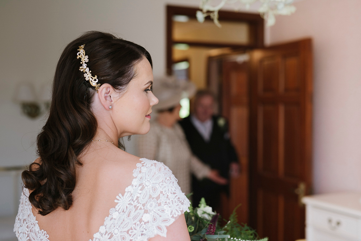 The bride wore a Peter Langner gown and the bridesmaids wore black Pronovias cocktail dresses. Photography by Saray Fyffe.