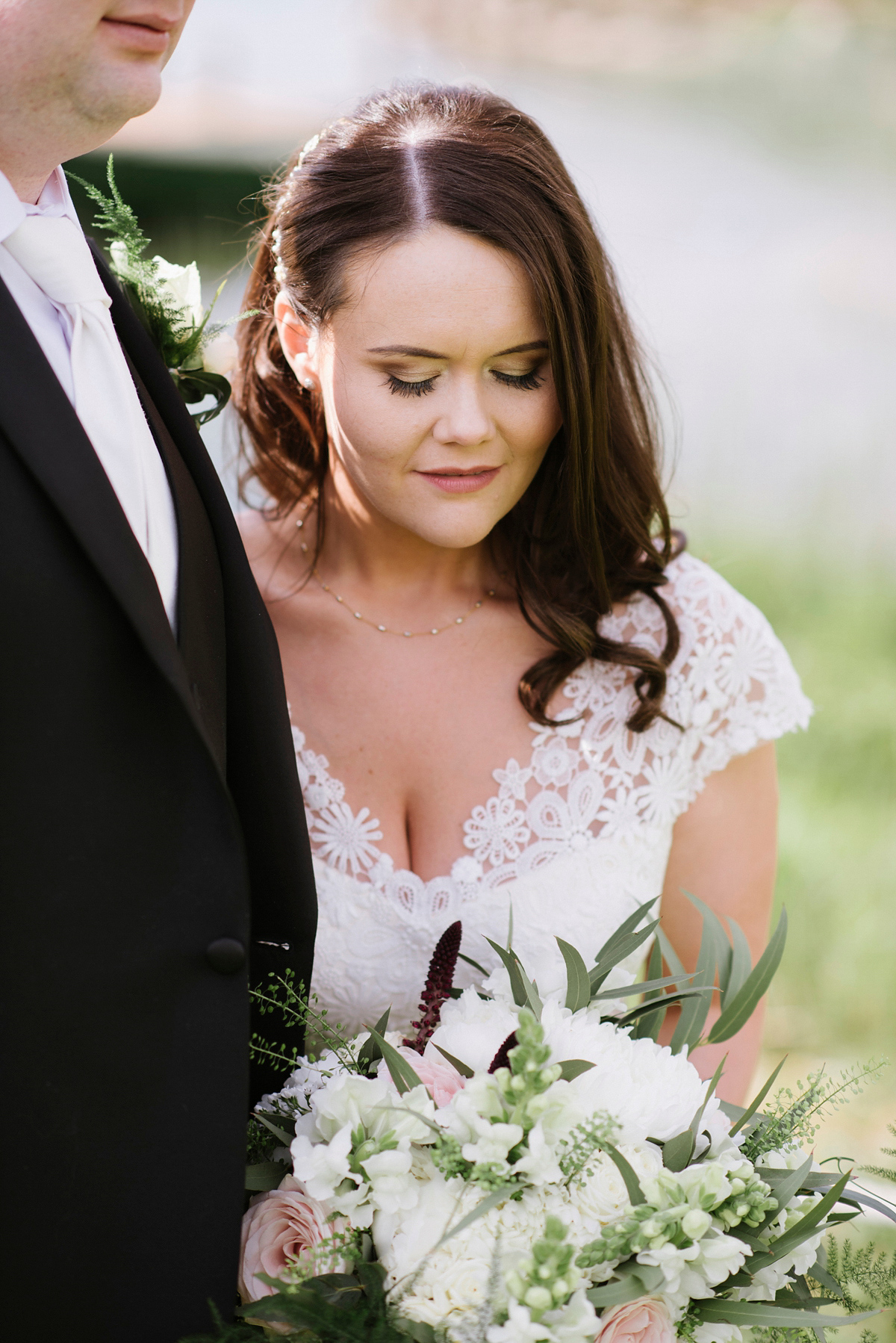 The bride wore a Peter Langner gown and the bridesmaids wore black Pronovias cocktail dresses. Photography by Saray Fyffe.