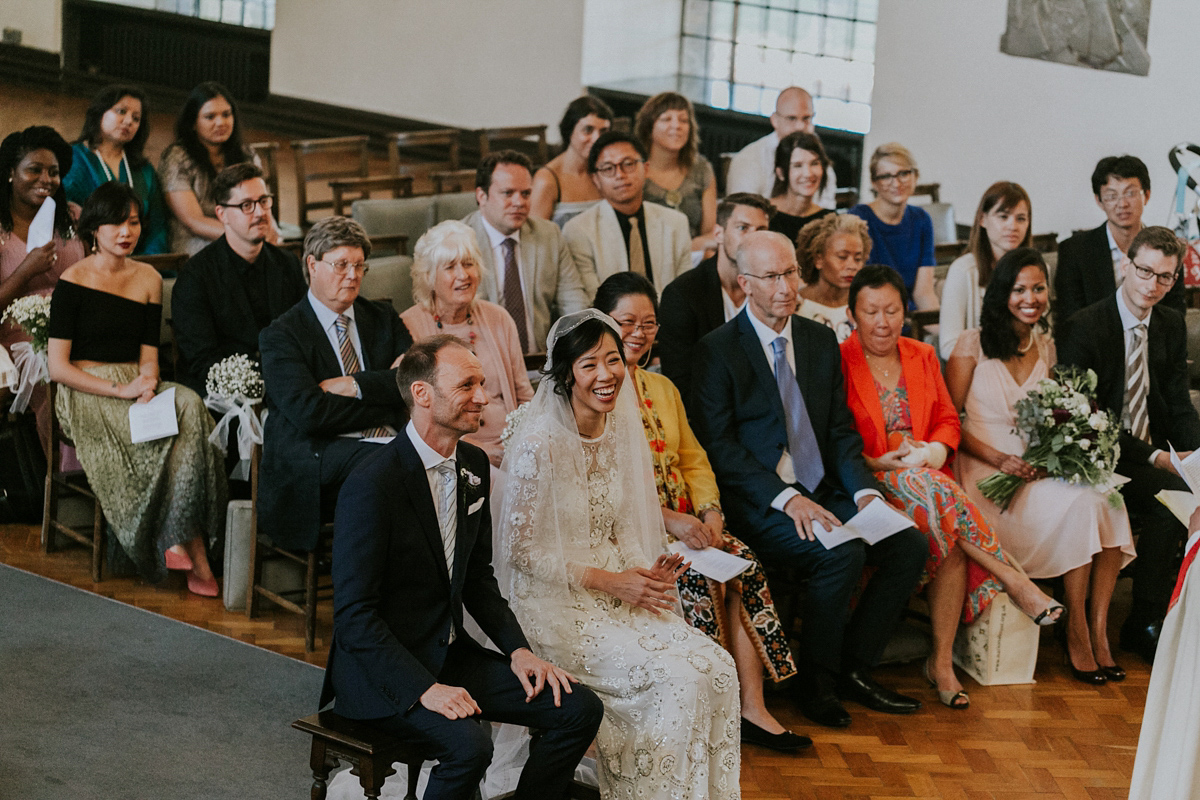 Bride Su wore a Needle & Thread wedding dress for her modern and elegant London wedding. She and her husband Nik met through online dating agency, Guardian Soulmates.
