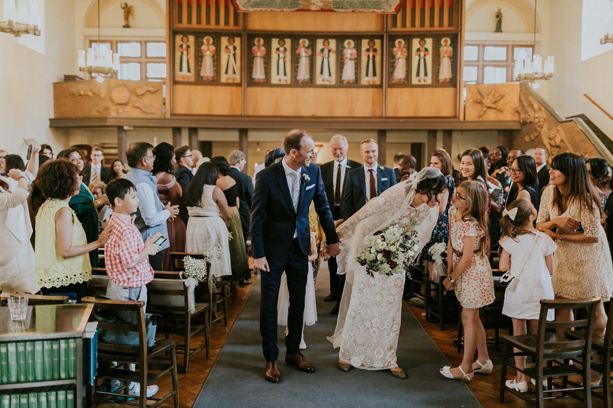 Bride Su wore a Needle & Thread wedding dress for her modern and elegant London wedding. She and her husband Nik met through online dating agency, Guardian Soulmates.
