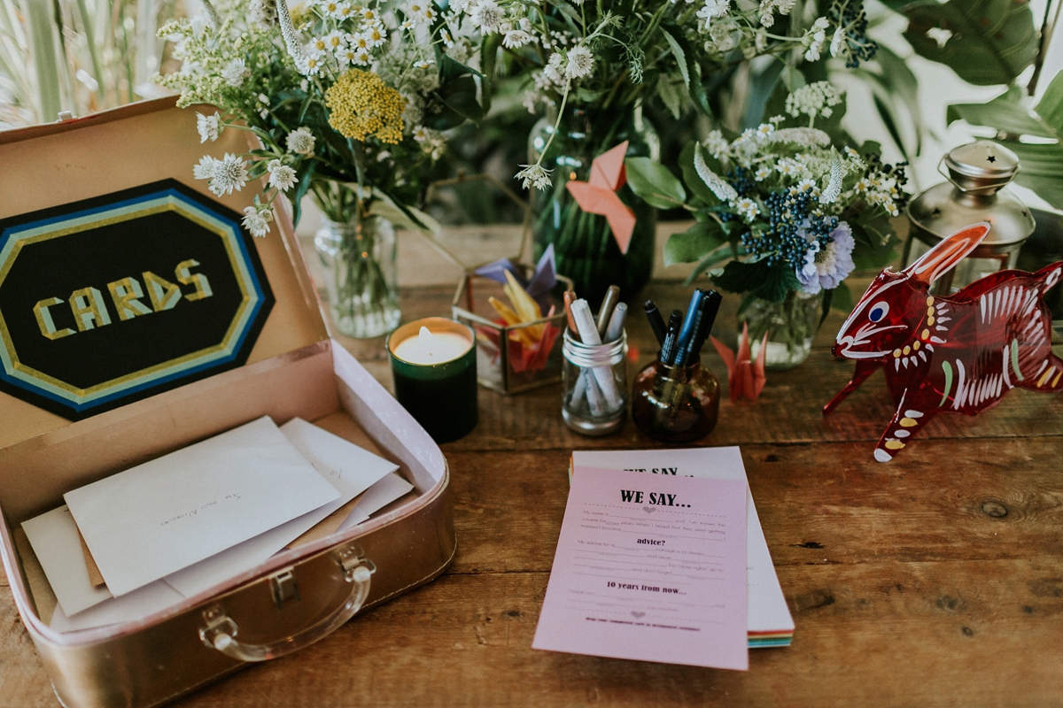 Bride Su wore a Needle & Thread wedding dress for her modern and elegant London wedding. She and her husband Nik met through online dating agency, Guardian Soulmates.