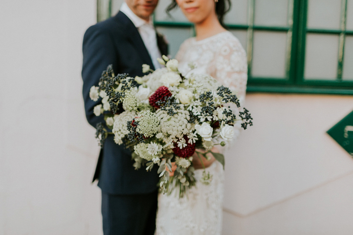 Bride Su wore a Needle & Thread wedding dress for her modern and elegant London wedding. She and her husband Nik met through online dating agency, Guardian Soulmates.
