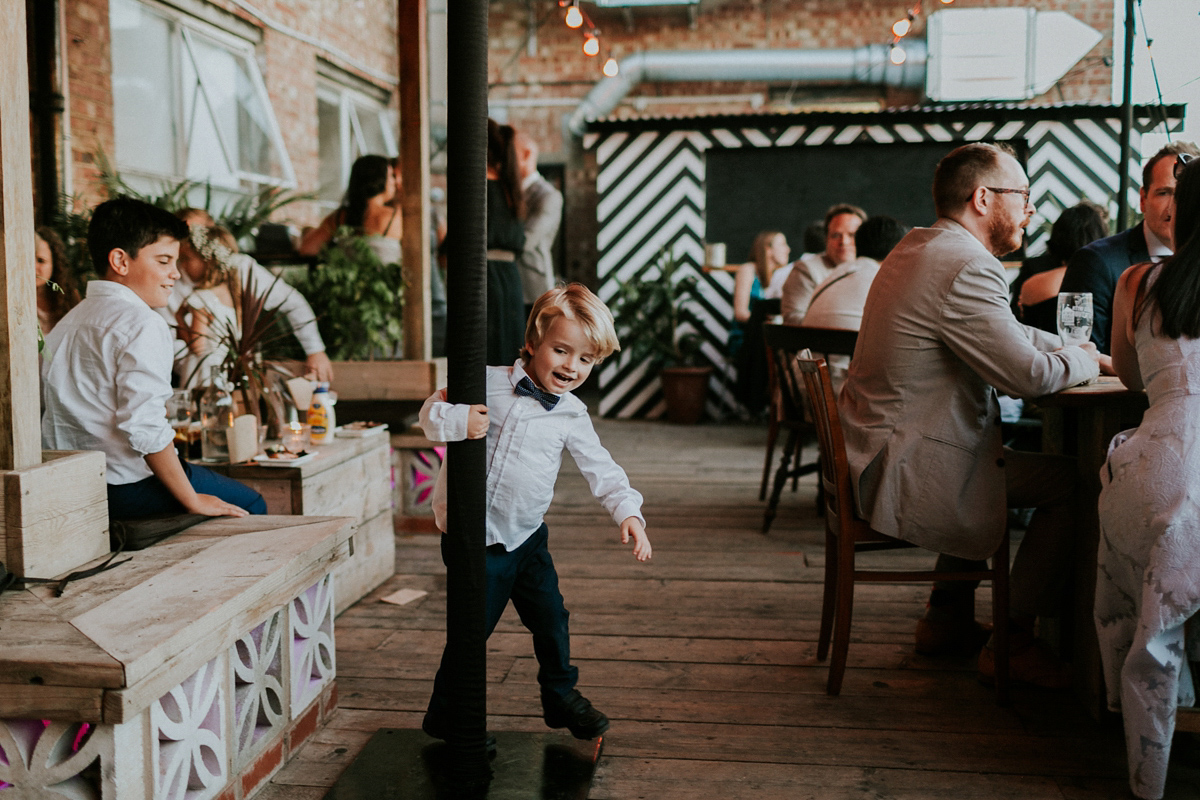 Bride Su wore a Needle & Thread wedding dress for her modern and elegant London wedding. She and her husband Nik met through online dating agency, Guardian Soulmates.