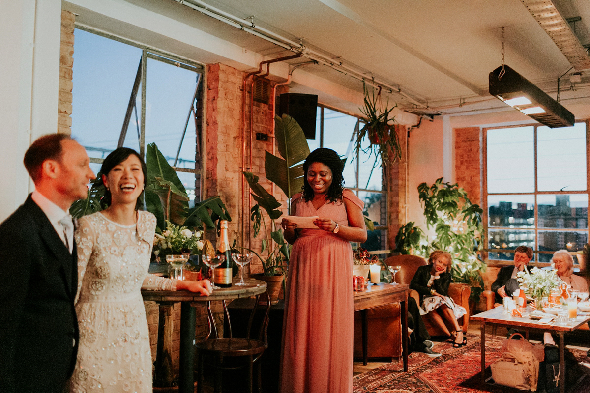 Bride Su wore a Needle & Thread wedding dress for her modern and elegant London wedding. She and her husband Nik met through online dating agency, Guardian Soulmates.