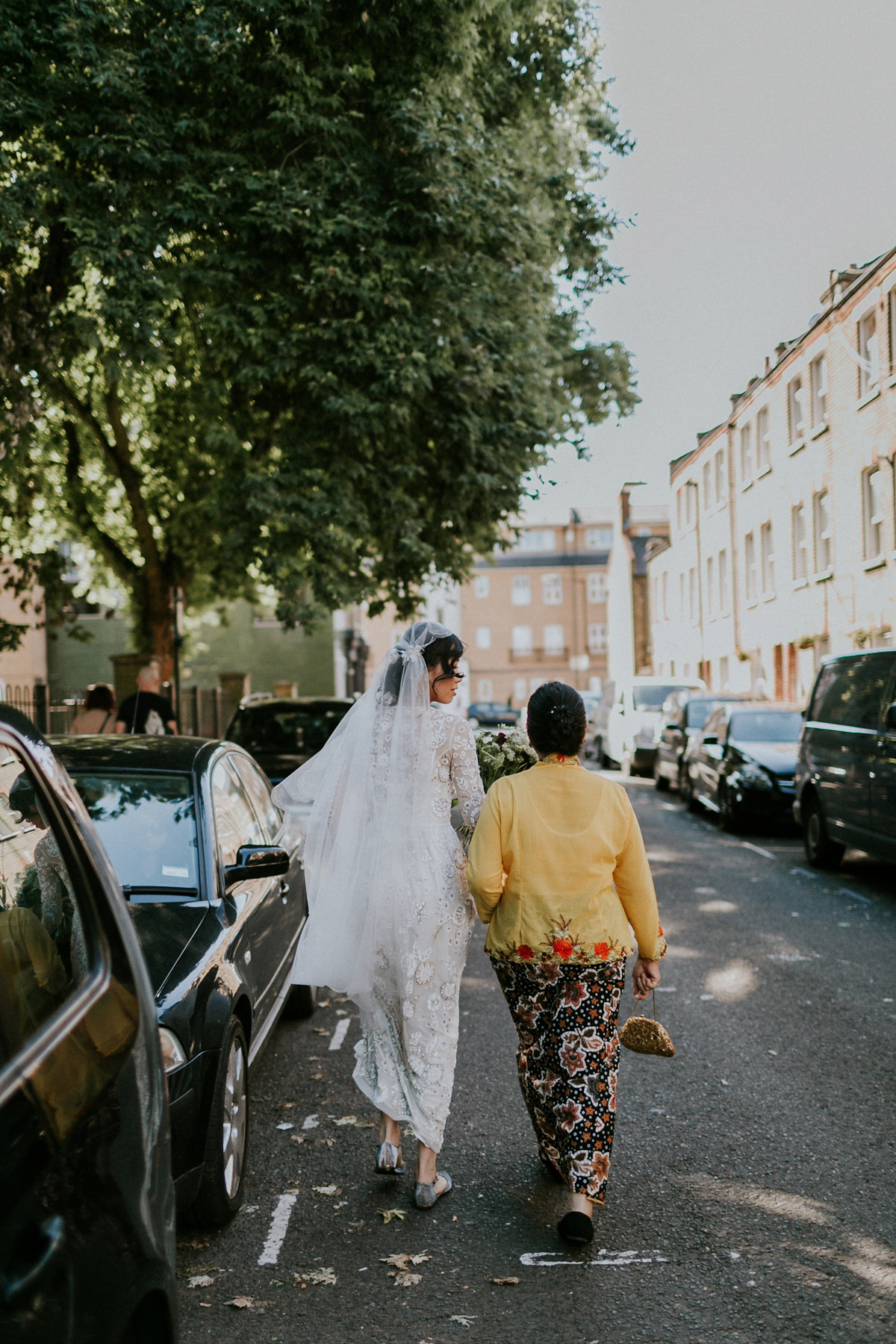 Bride Su wore a Needle & Thread wedding dress for her modern and elegant London wedding. She and her husband Nik met through online dating agency, Guardian Soulmates.