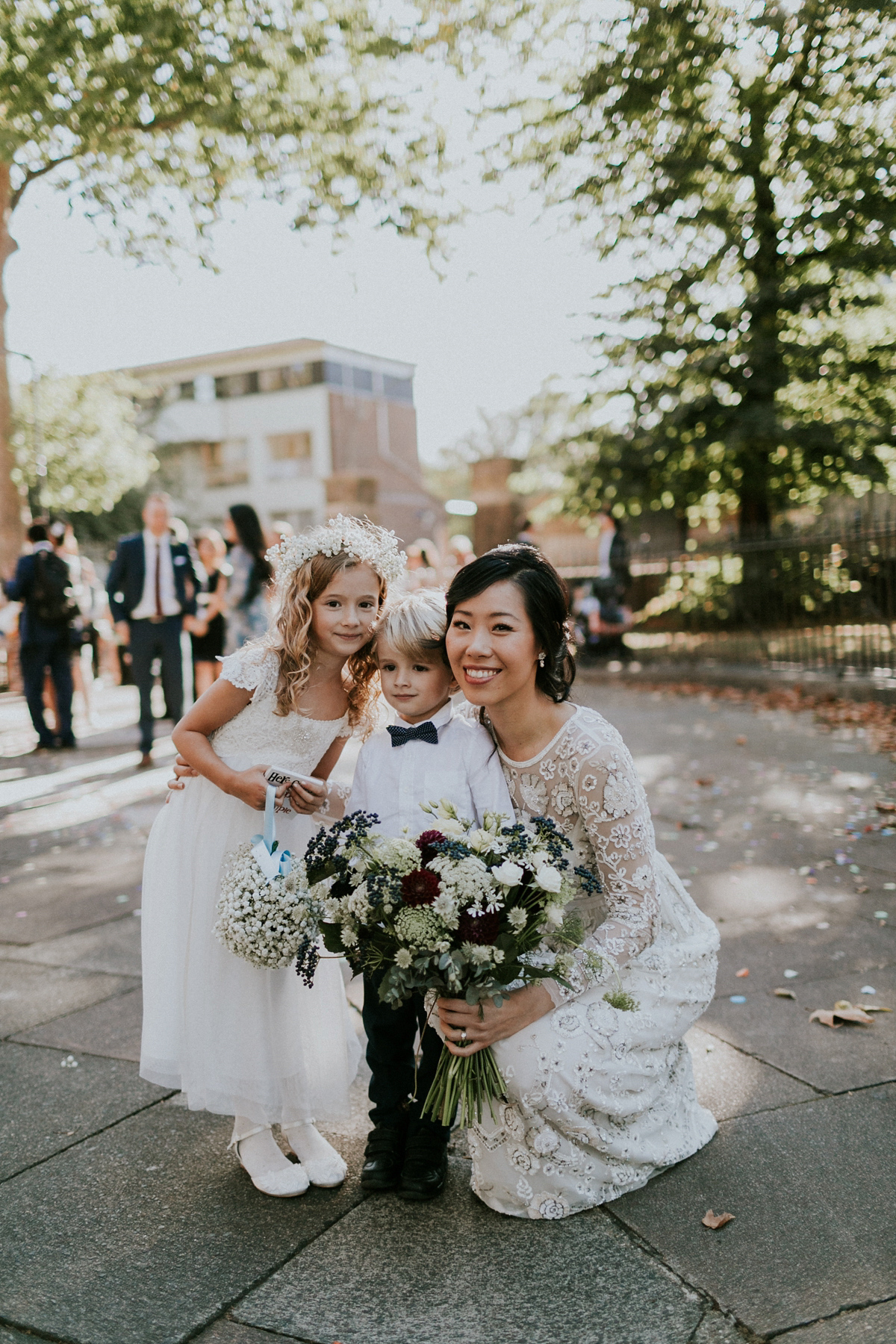 Bride Su wore a Needle & Thread wedding dress for her modern and elegant London wedding. She and her husband Nik met through online dating agency, Guardian Soulmates.