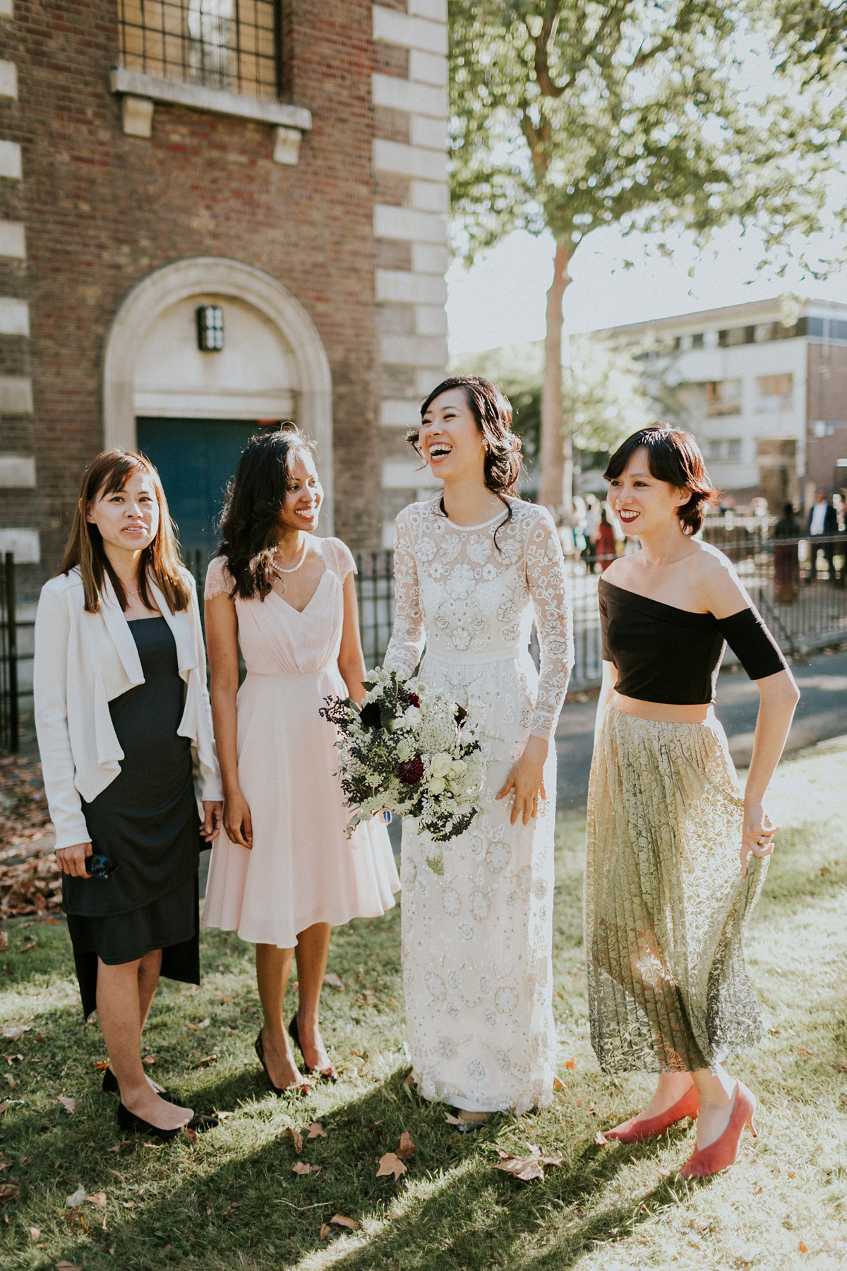 Bride Su wore a Needle & Thread wedding dress for her modern and elegant London wedding. She and her husband Nik met through online dating agency, Guardian Soulmates.