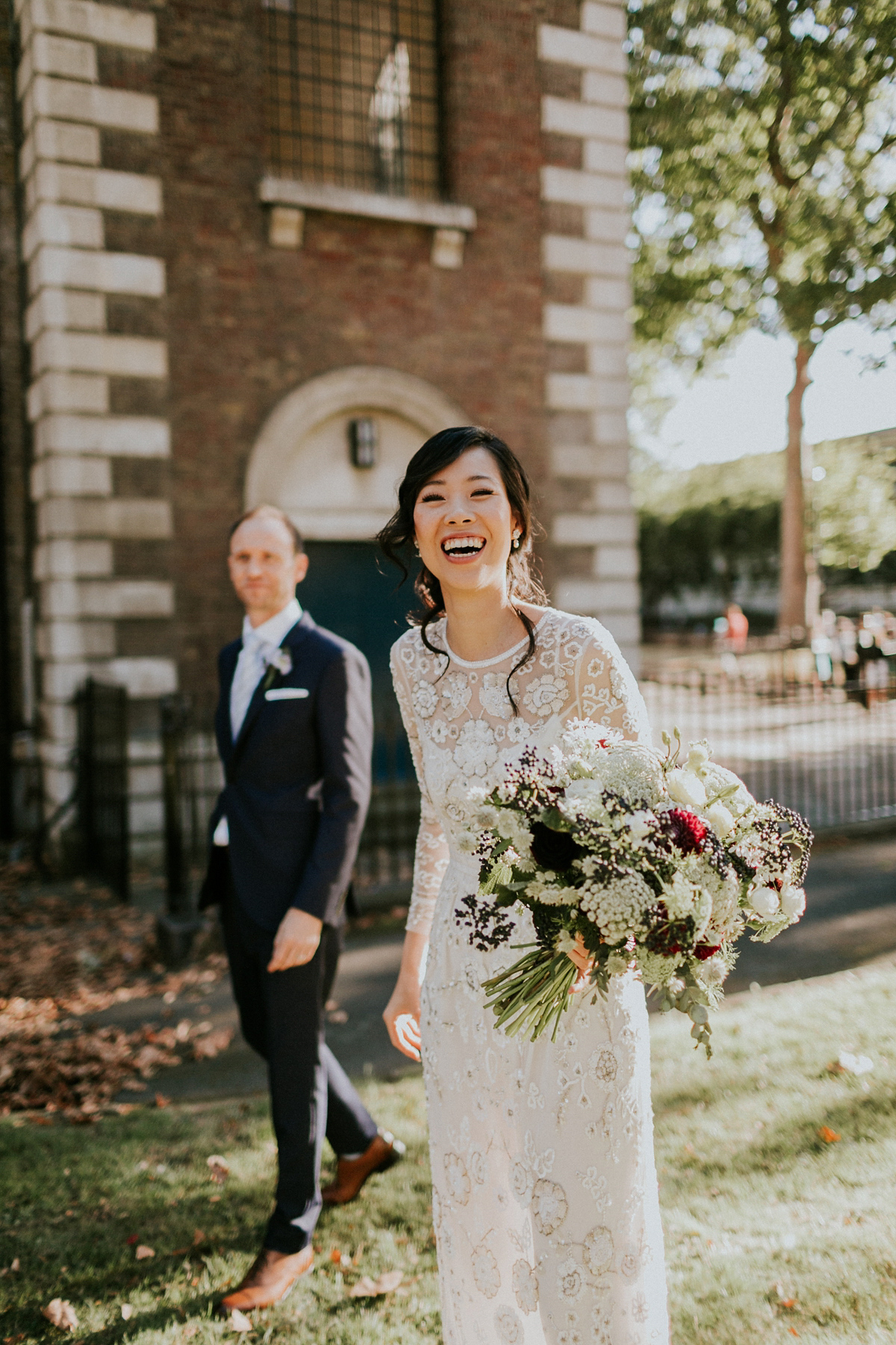 Bride Su wore a Needle & Thread wedding dress for her modern and elegant London wedding. She and her husband Nik met through online dating agency, Guardian Soulmates.