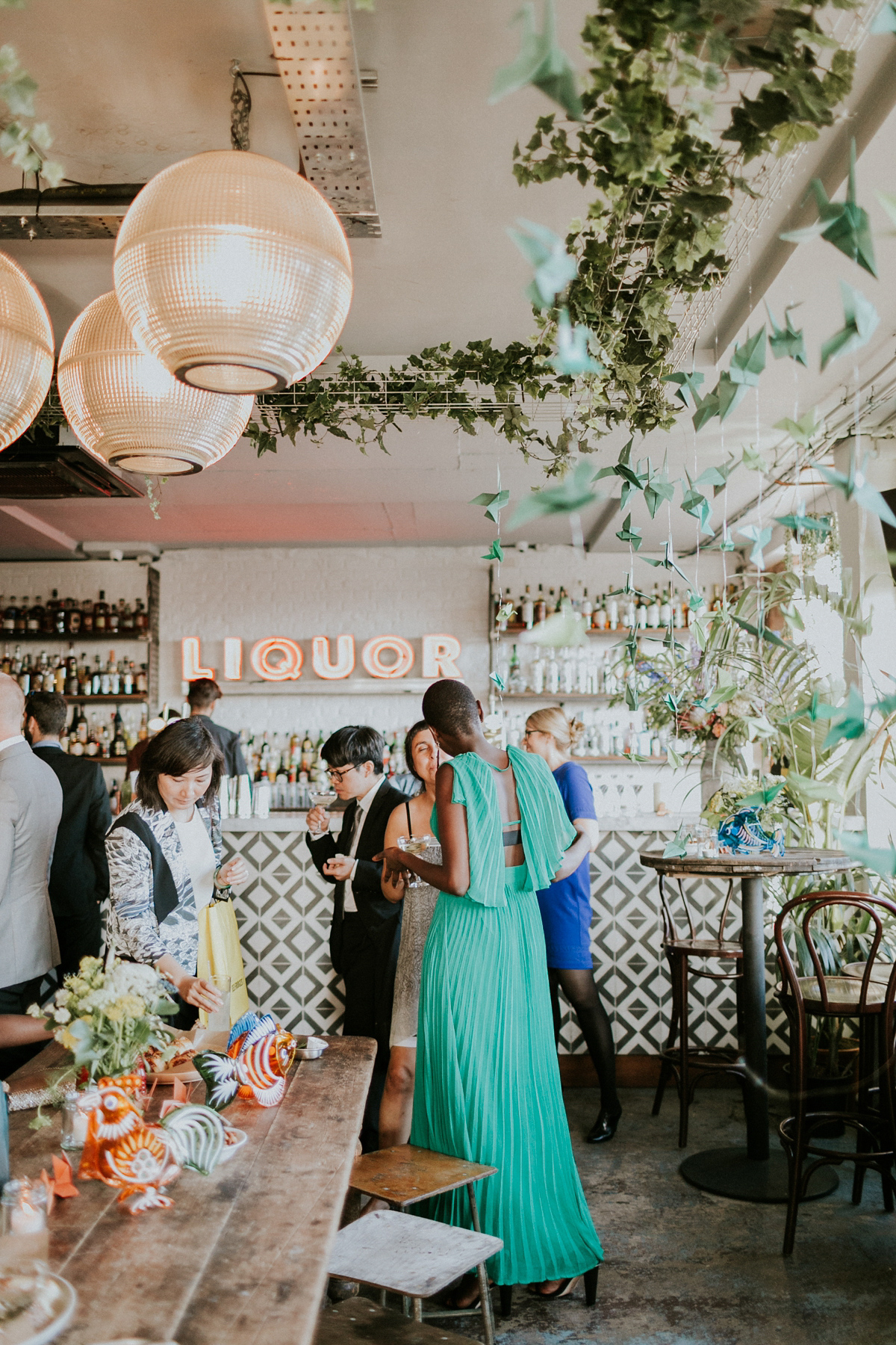 Bride Su wore a Needle & Thread wedding dress for her modern and elegant London wedding. She and her husband Nik met through online dating agency, Guardian Soulmates.
