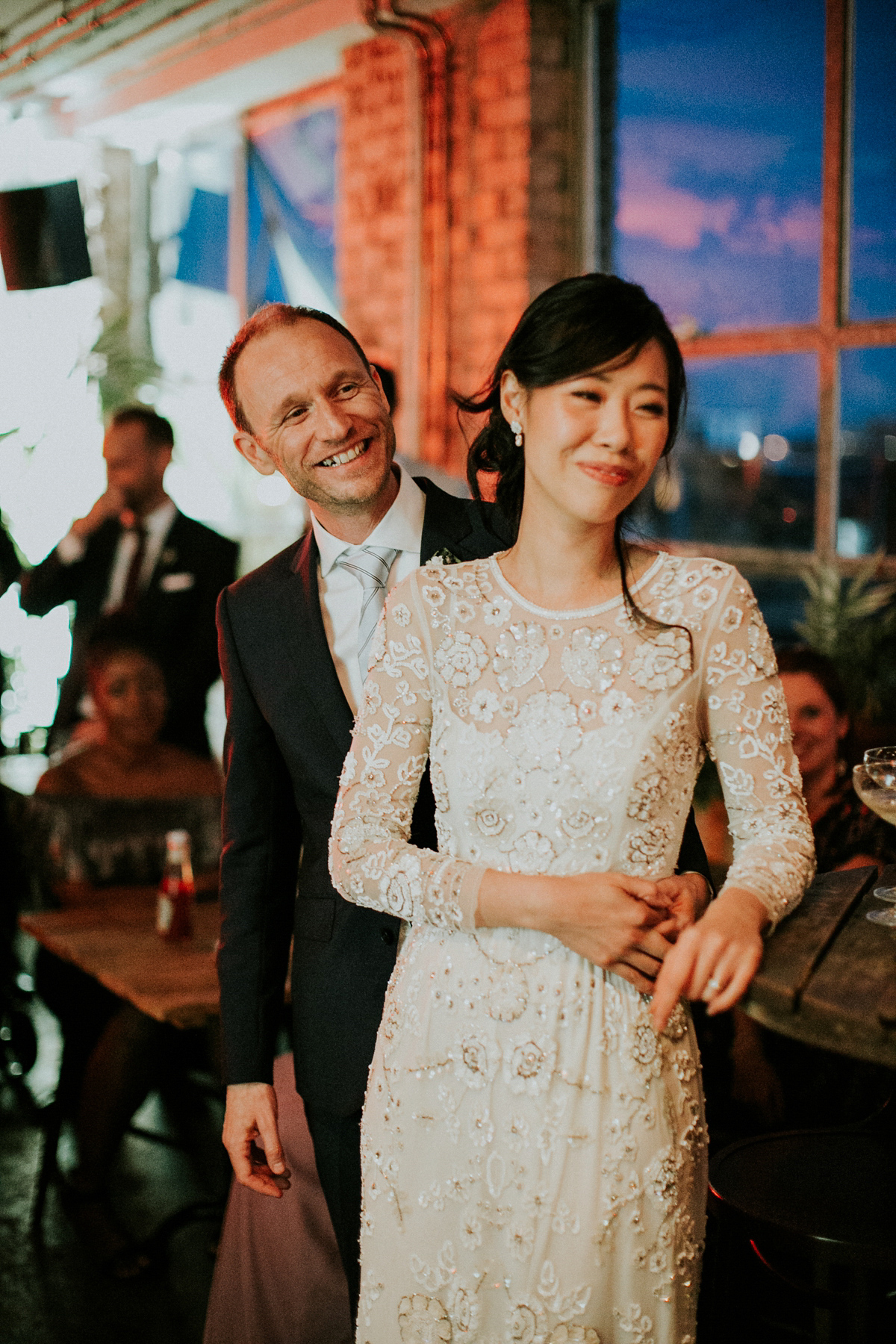 Bride Su wore a Needle & Thread wedding dress for her modern and elegant London wedding. She and her husband Nik met through online dating agency, Guardian Soulmates.