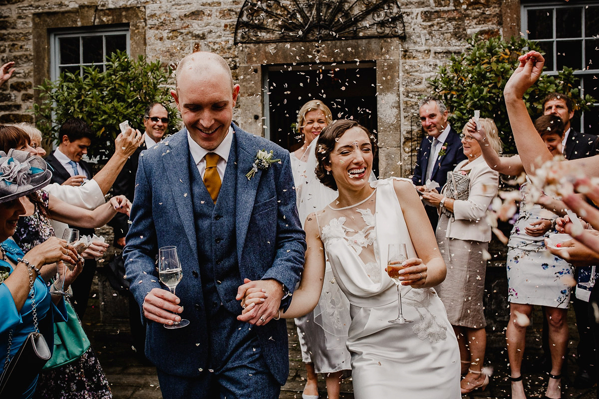 A David Fielden gown for a wedding at Pennard House in Somerset. Photography by Noel Deasington.