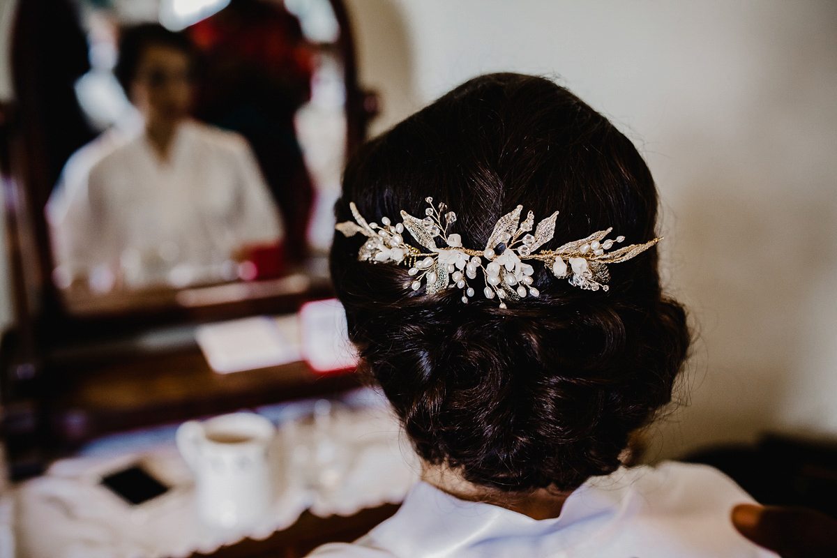 A David Fielden gown for a wedding at Pennard House in Somerset. Photography by Noel Deasington.