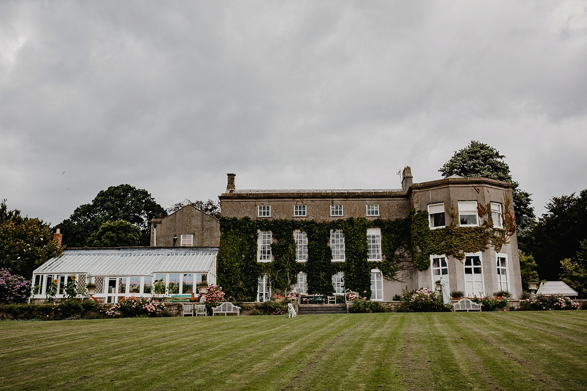 A David Fielden gown for a wedding at Pennard House in Somerset. Photography by Noel Deasington.